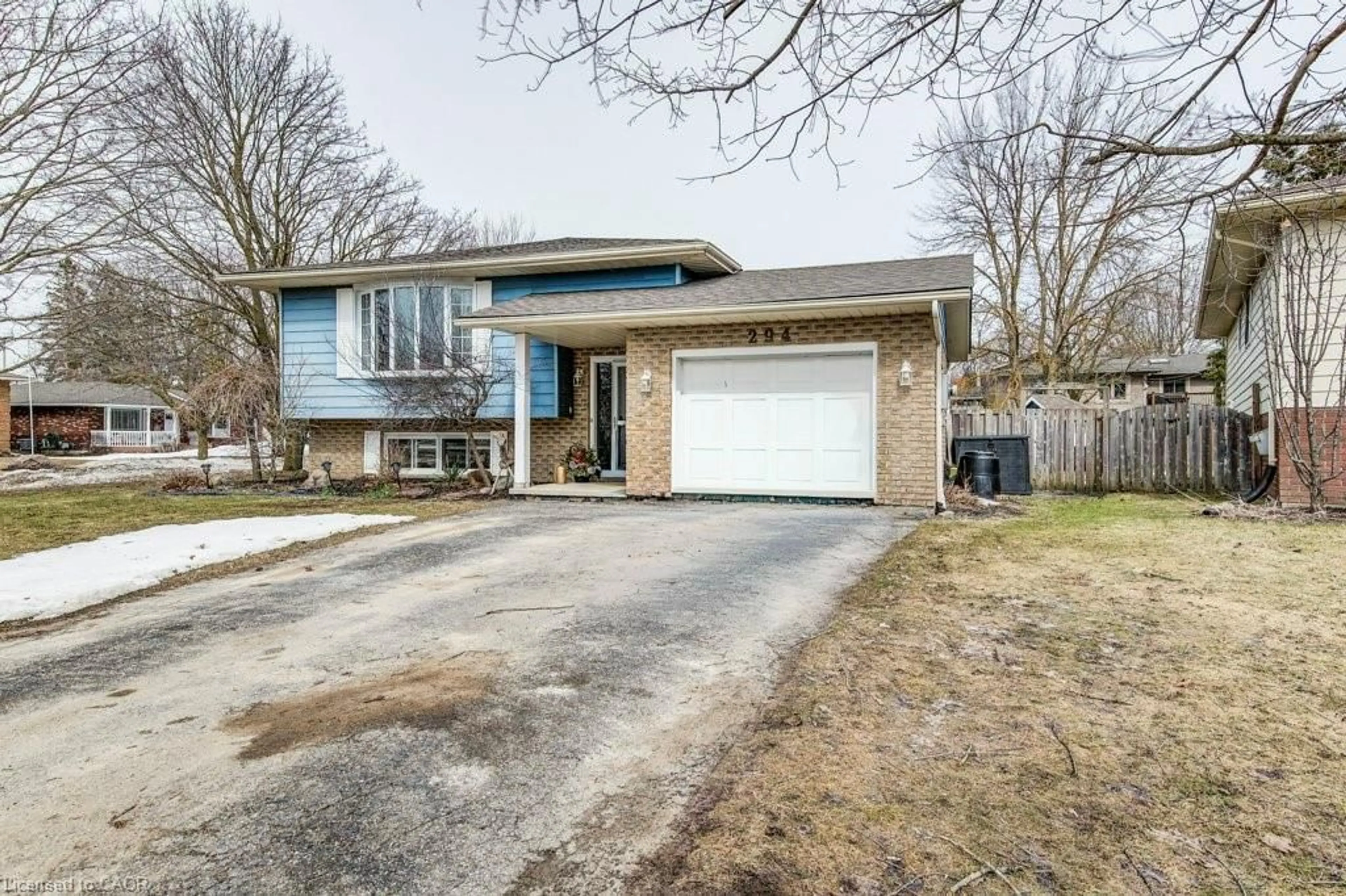 Home with brick exterior material, street for 294 Forest Glen Dr, Mount Forest Ontario N0G 2L2