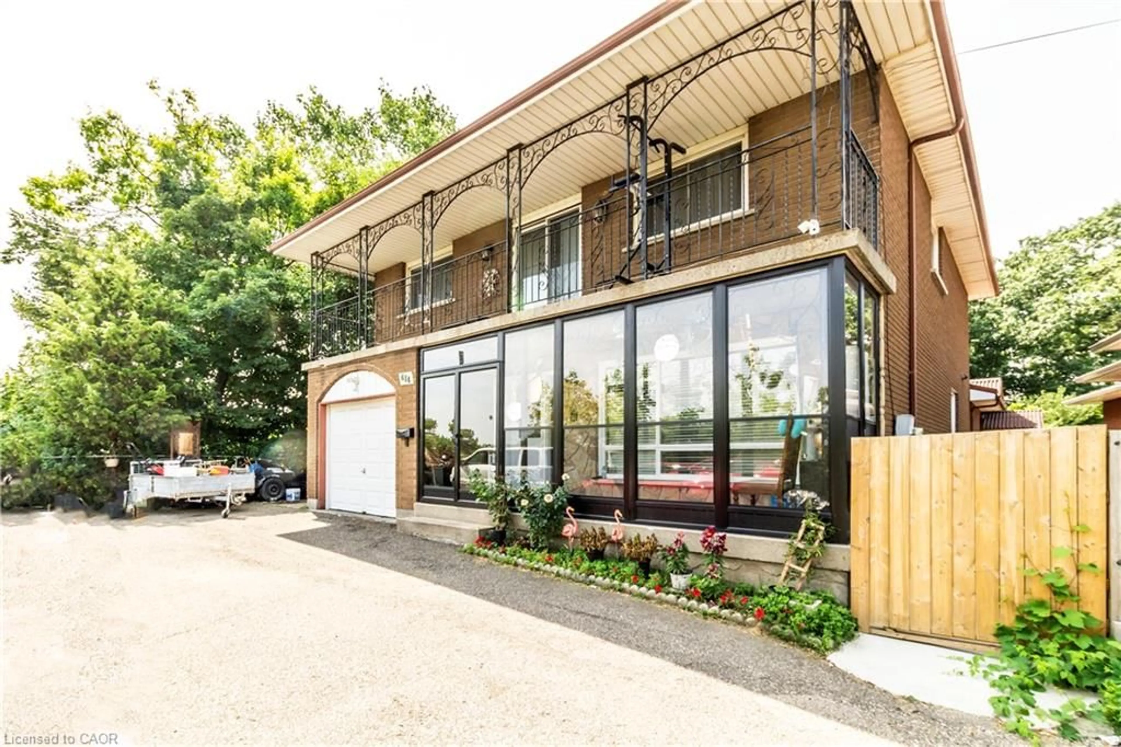 Home with brick exterior material, street for 404 Queenston Rd, Hamilton Ontario L8K 1J2