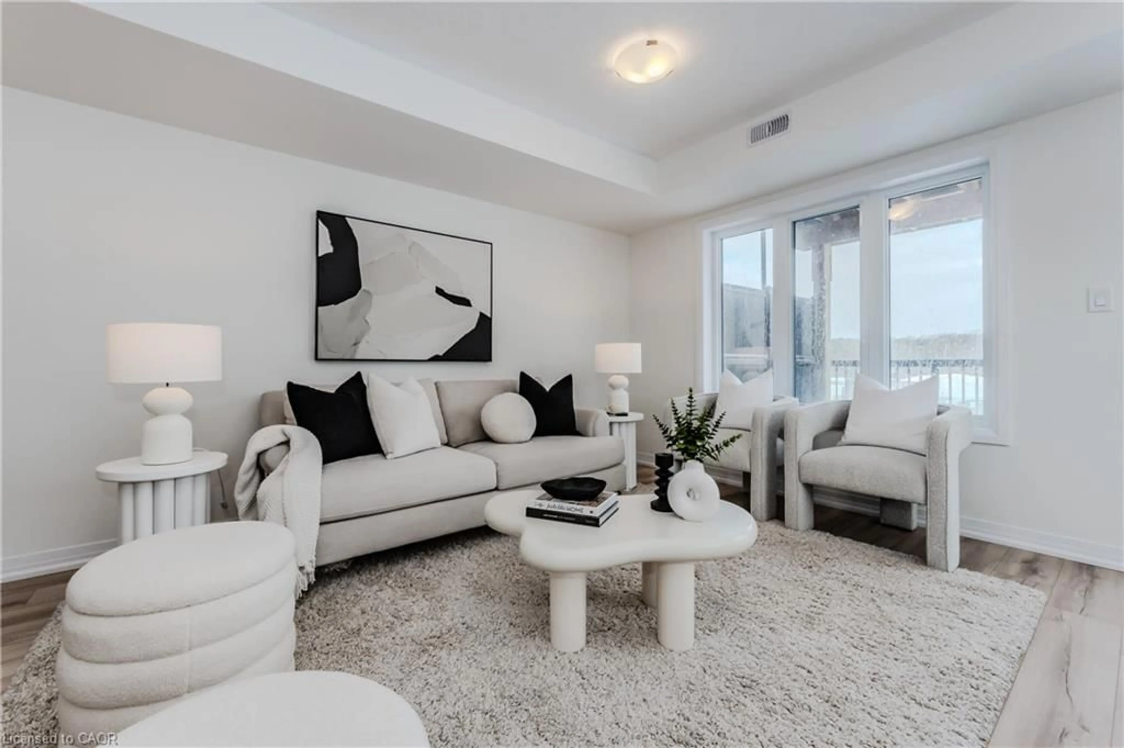 Living room with furniture, unknown for 15 Stauffer Woods Trail #A4, Kitchener Ontario N2P 2P4