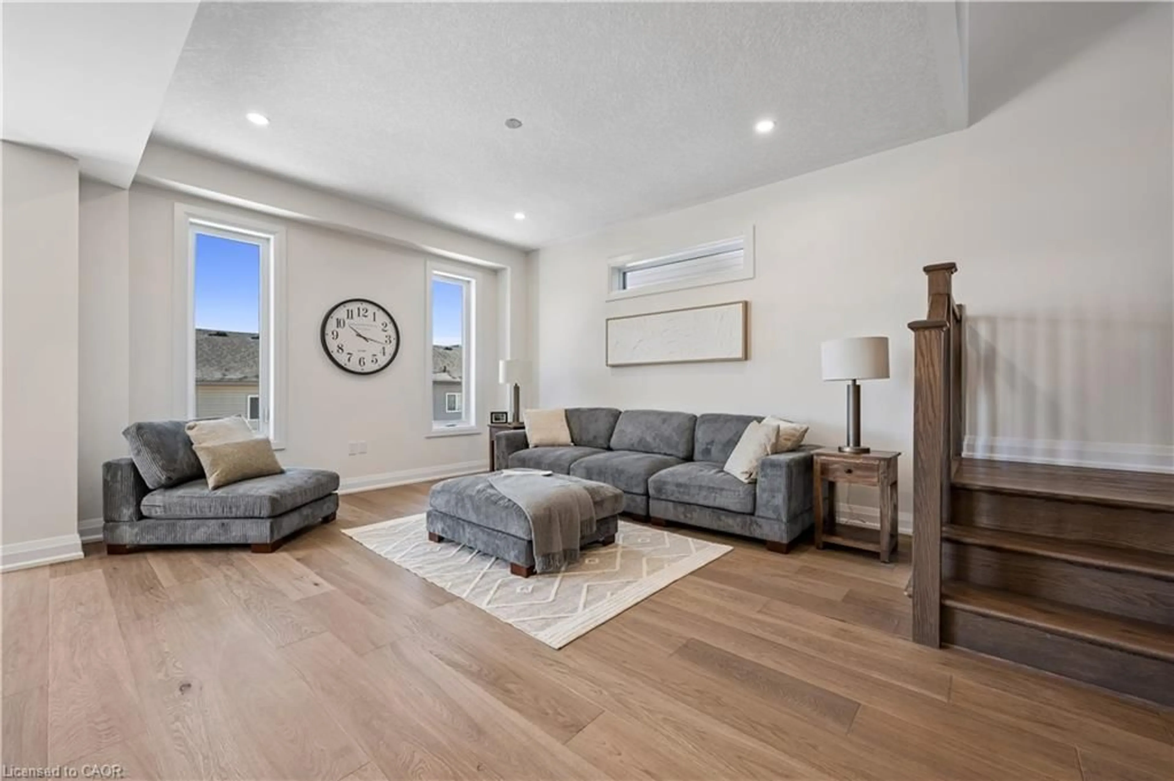 Living room with furniture, wood/laminate floor for 346 Canada Plum St, Waterloo Ontario N2V 0H9