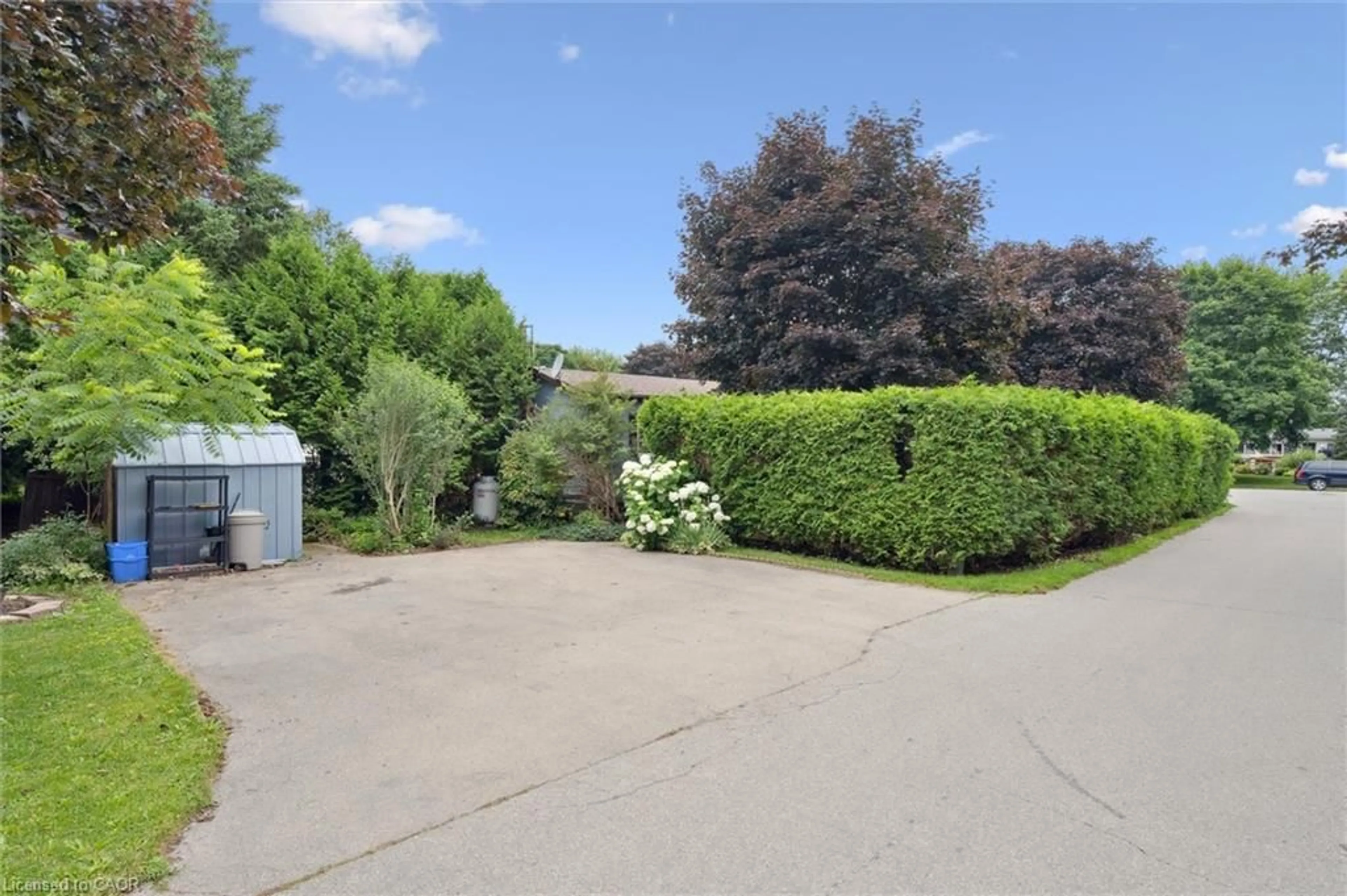 A pic from outside/outdoor area/front of a property/back of a property/a pic from drone, street for 1294 Concession 8 Rd #93 Maple, Hamilton Ontario N0B 2J0