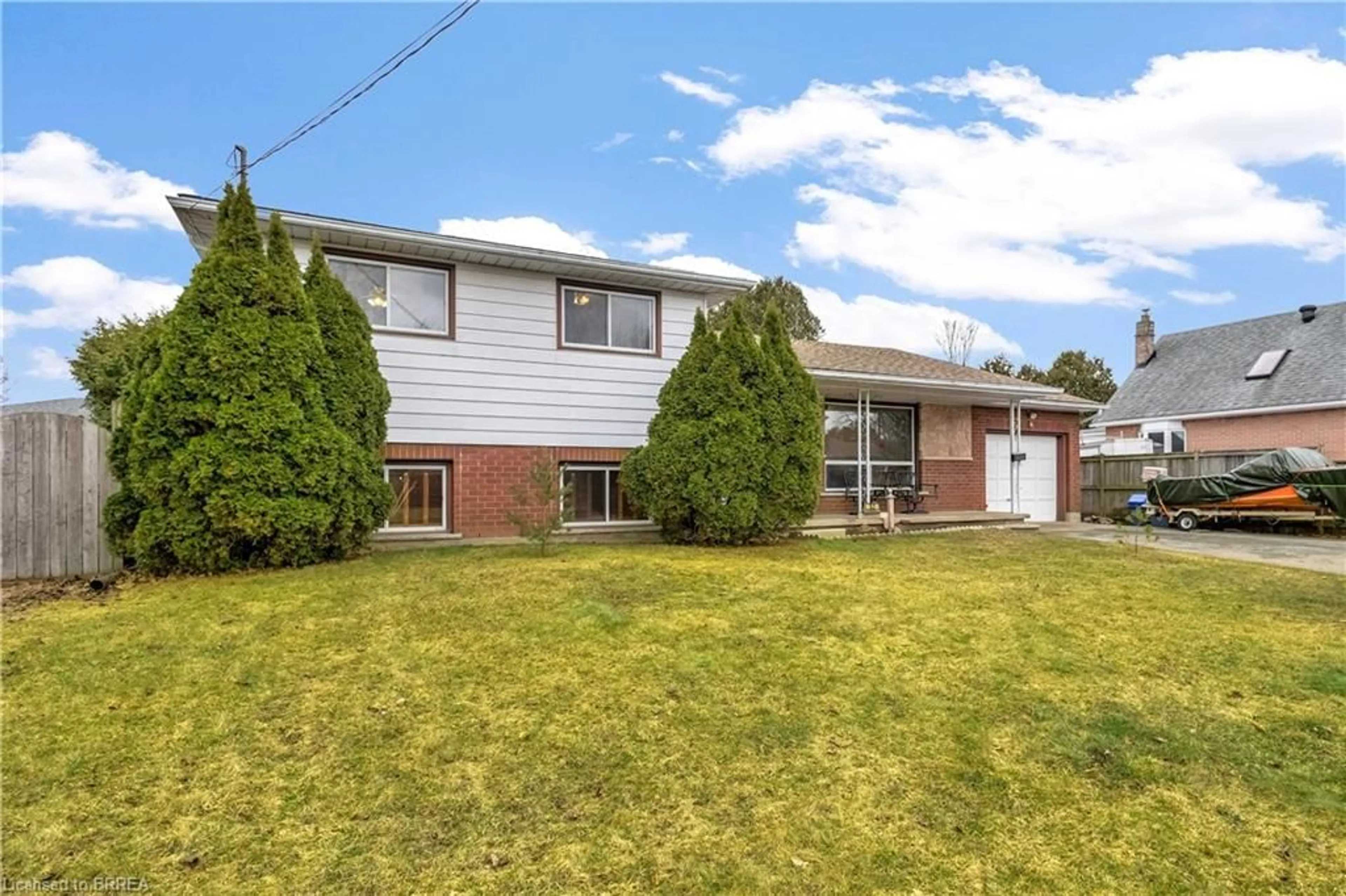 Home with brick exterior material, street for 52 Charles St, Brantford Ontario N3T 1B3