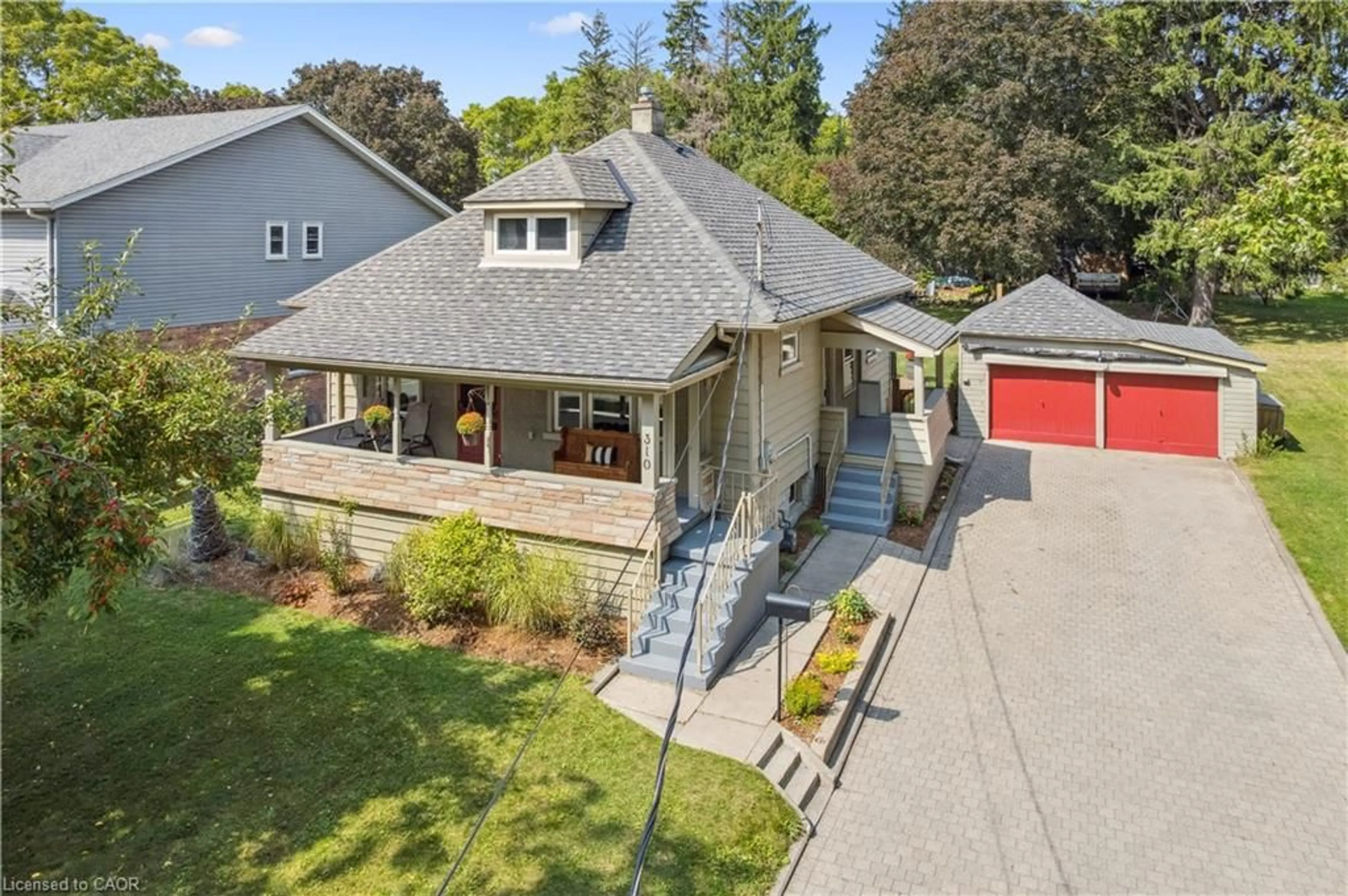 A pic from outside/outdoor area/front of a property/back of a property/a pic from drone, street for 310 Kitchener Rd, Cambridge Ontario N3H 1A6