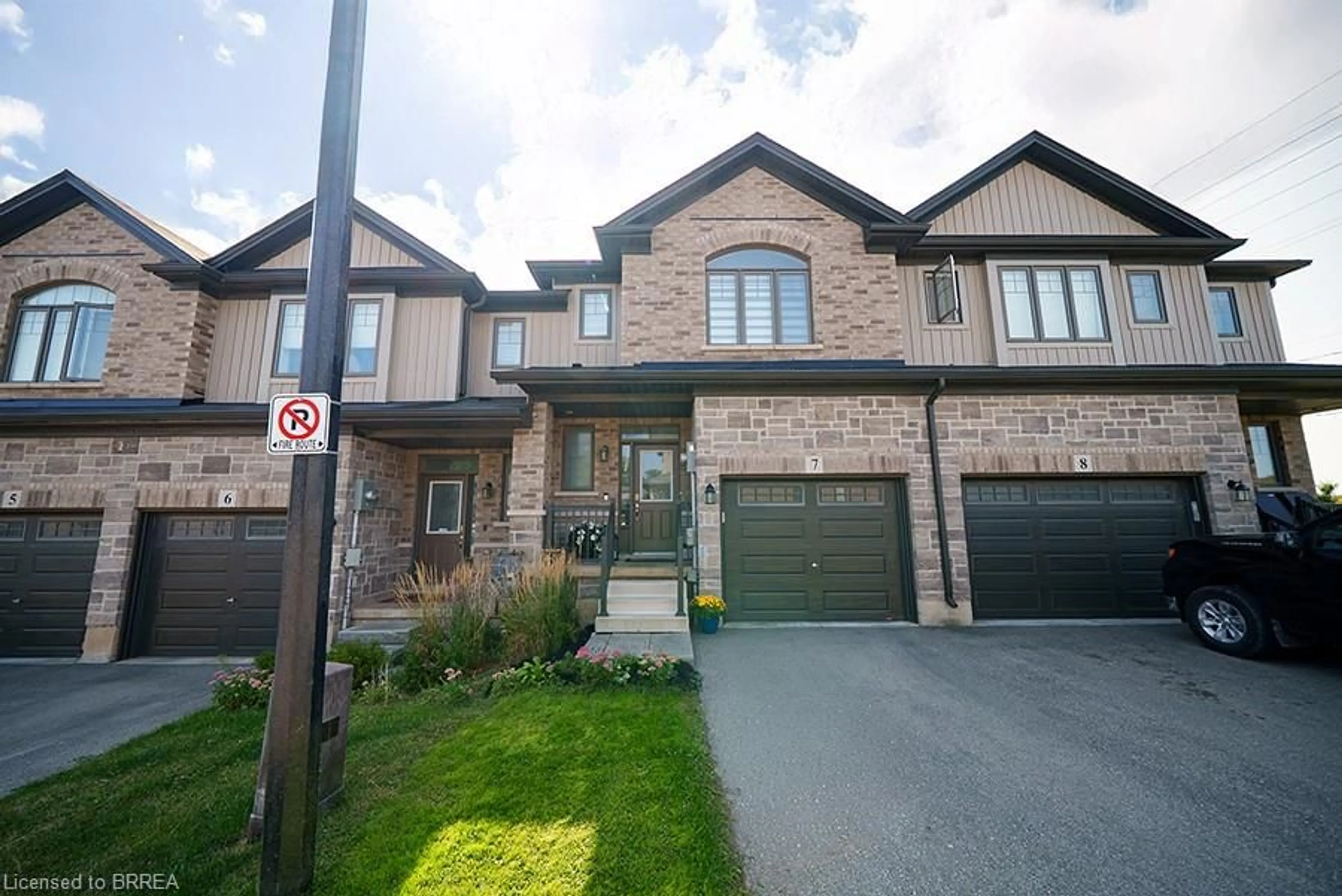 Home with brick exterior material, street for 1 Tom Brown Dr #7, Paris Ontario N3L 0H8