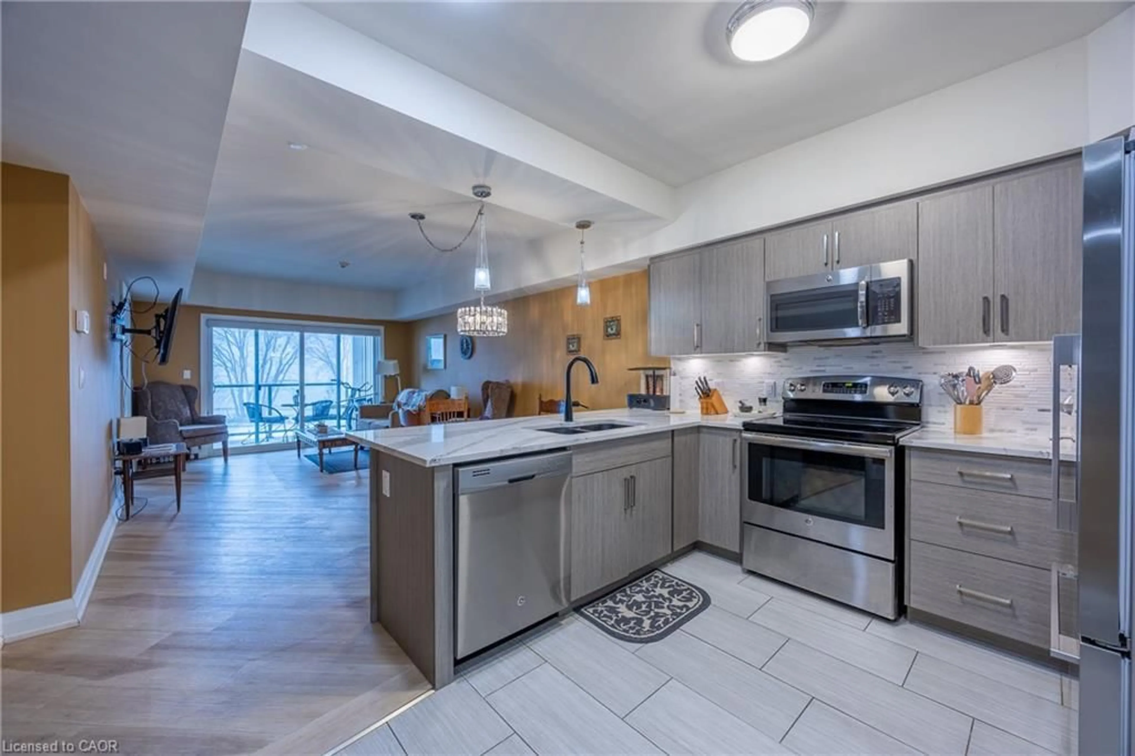 Open concept kitchen, ceramic/tile floor for 12 Erie Blvd #203, Long Point Ontario N0E 1M0