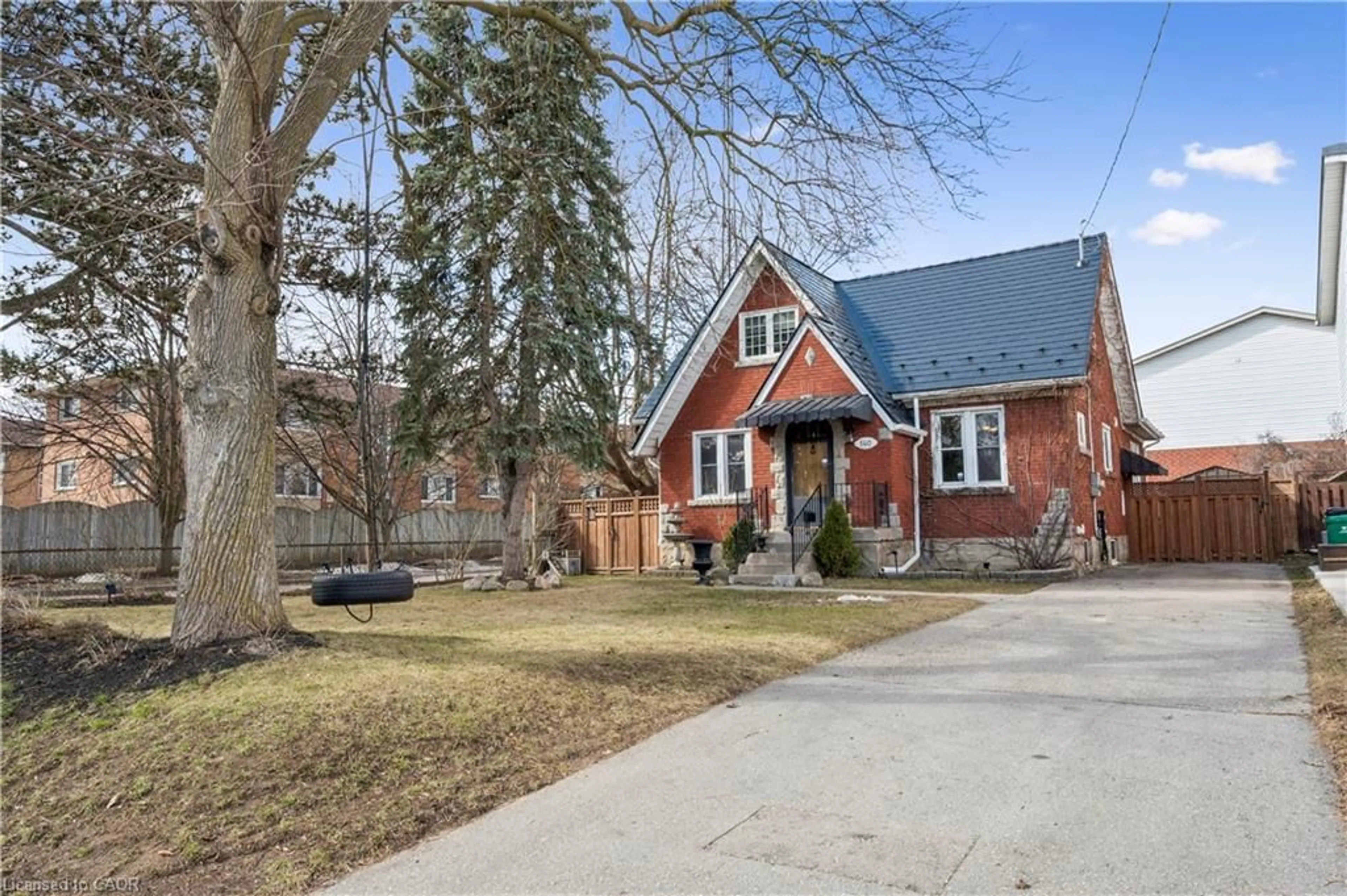 Home with brick exterior material, street for 140 Heiman St, Kitchener Ontario N2M 3L9