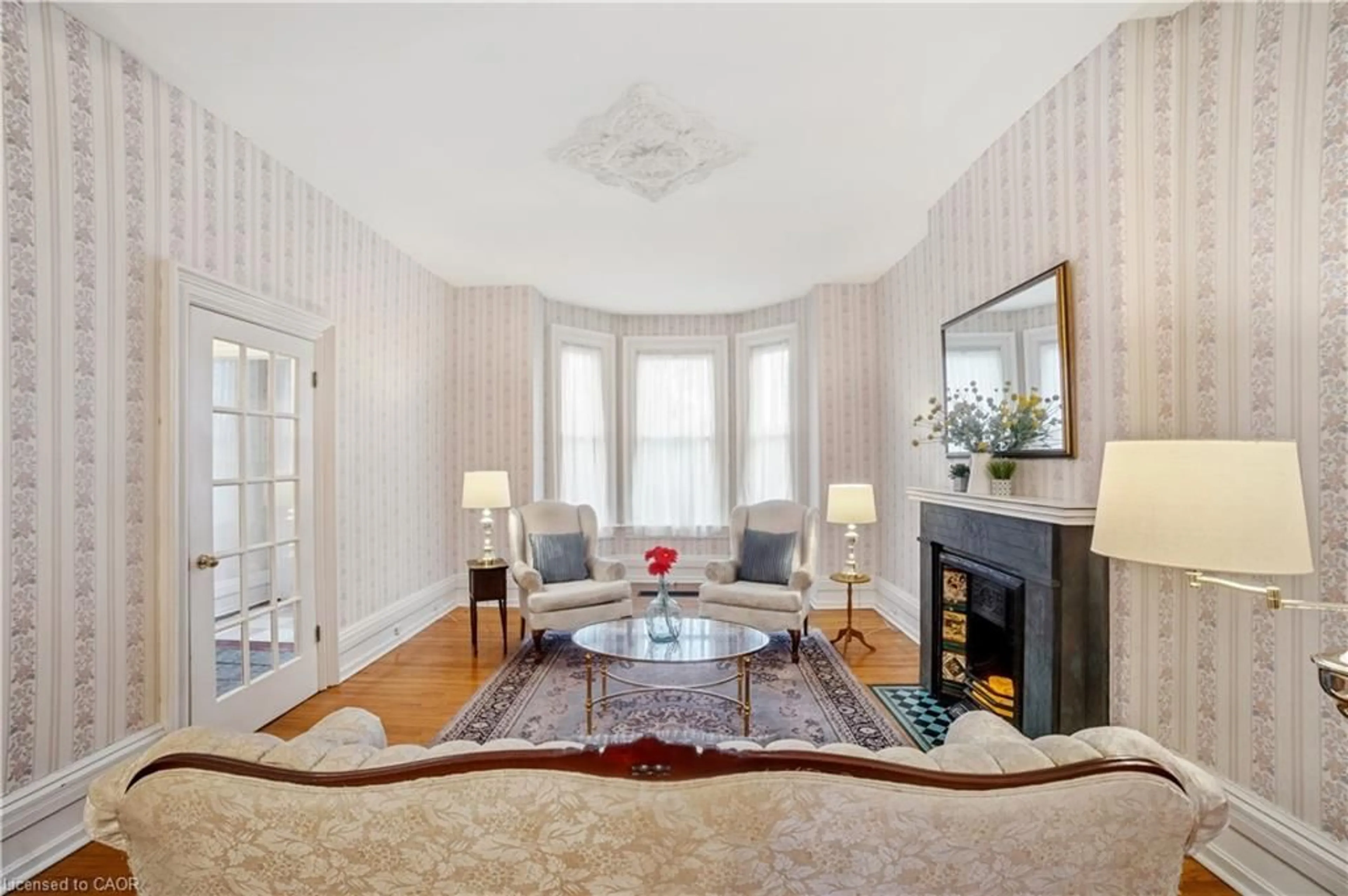 Living room with furniture, unknown for 306 John St, Hamilton Ontario L8L 4P9