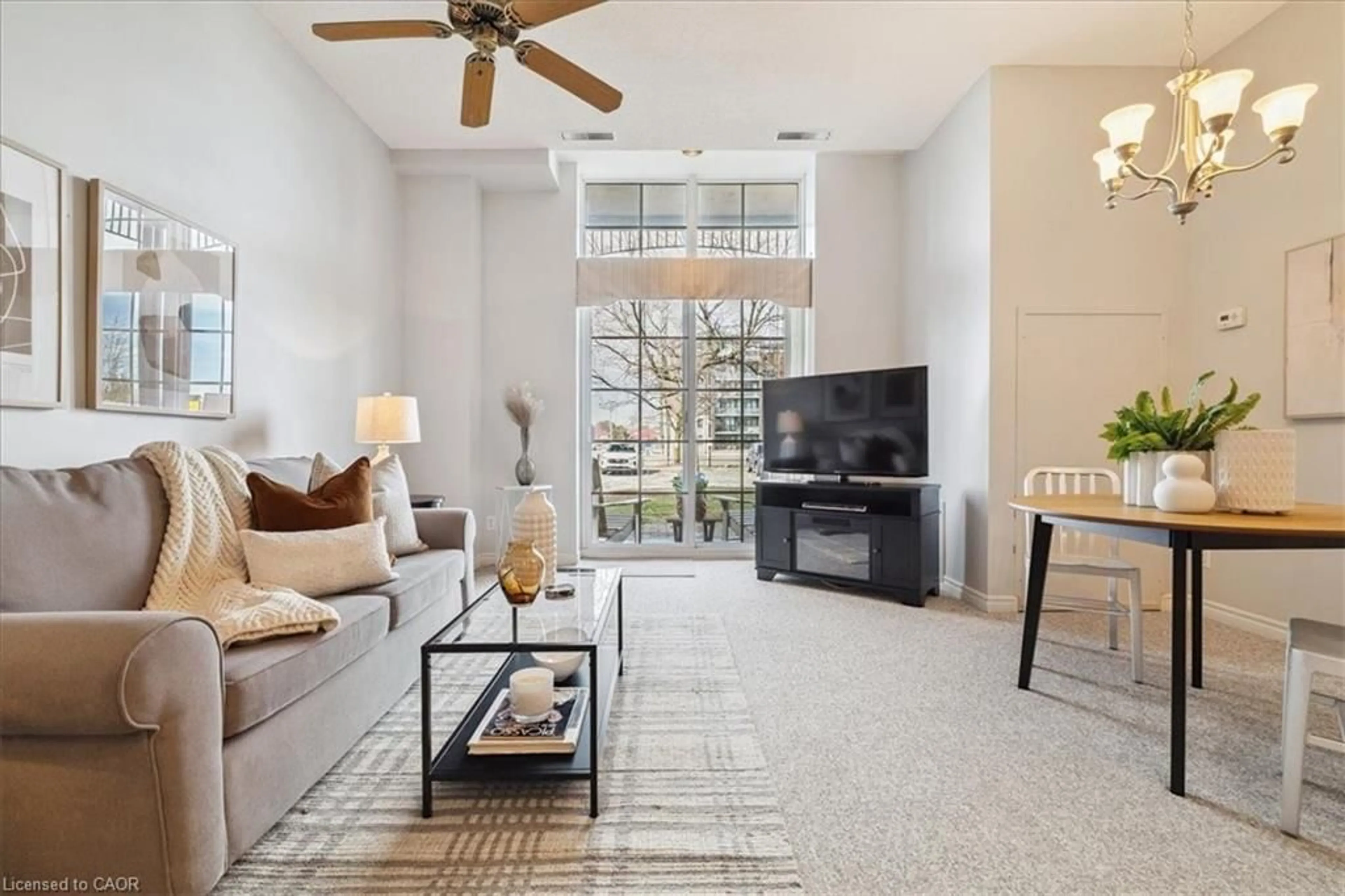 Living room with furniture, ceramic/tile floor for 262 Dundas St #108, Waterdown Ontario L8B 1A9