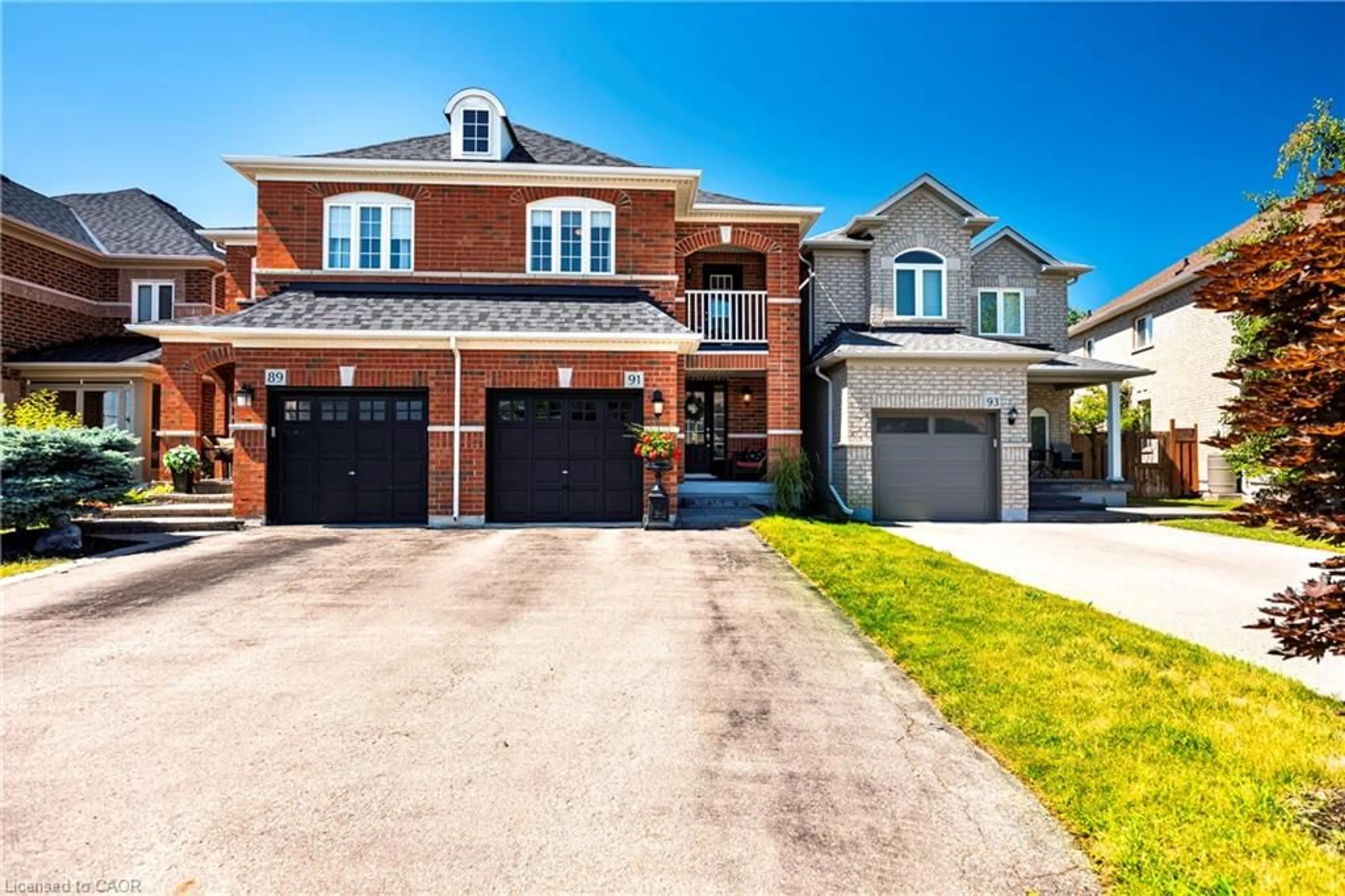 Home with brick exterior material, street for 91 Snowberry Cres, Georgetown Ontario L7G 6M8
