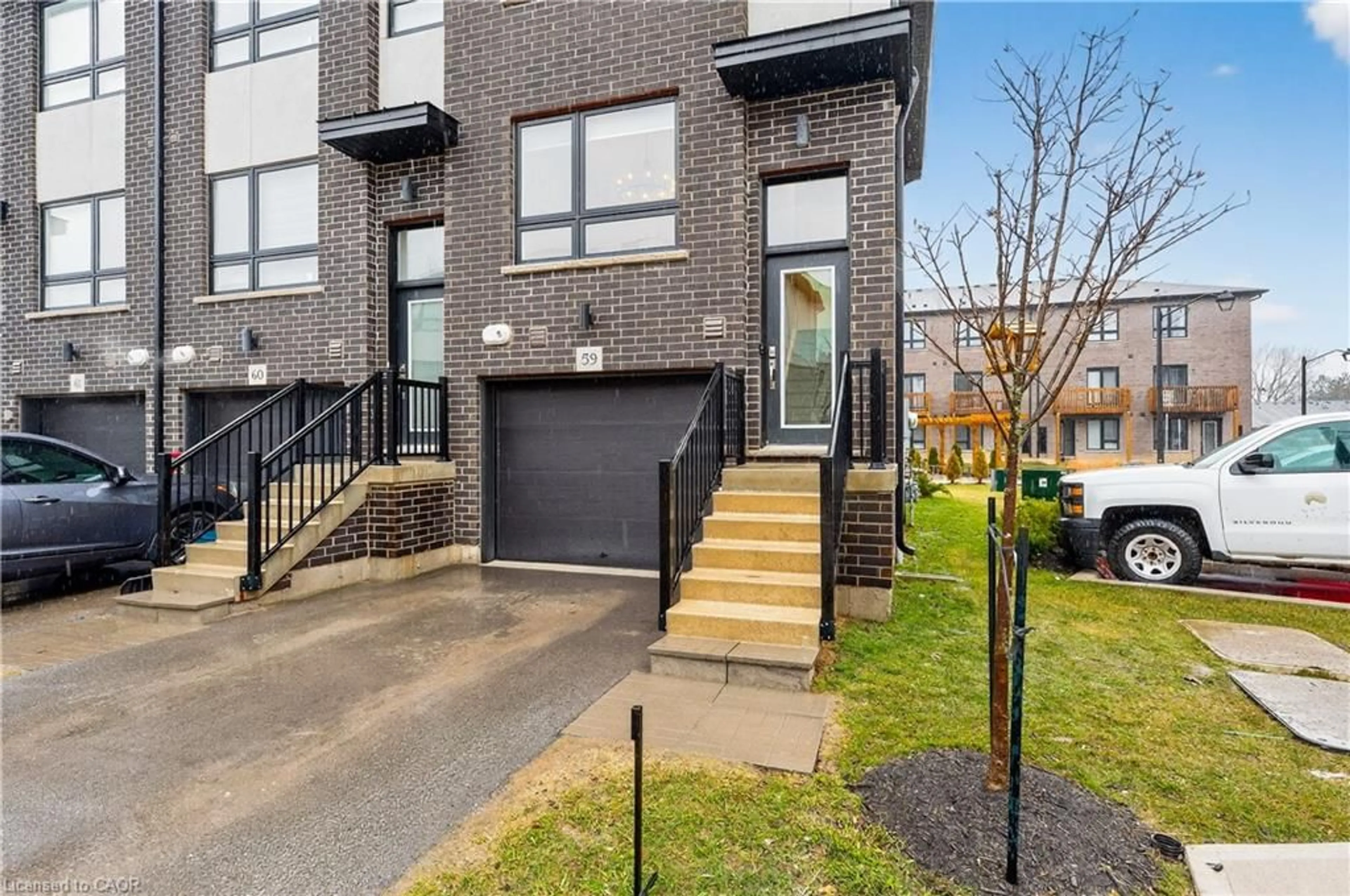 Home with brick exterior material, street for 720 Grey St #59, Brantford Ontario N3S 0K2