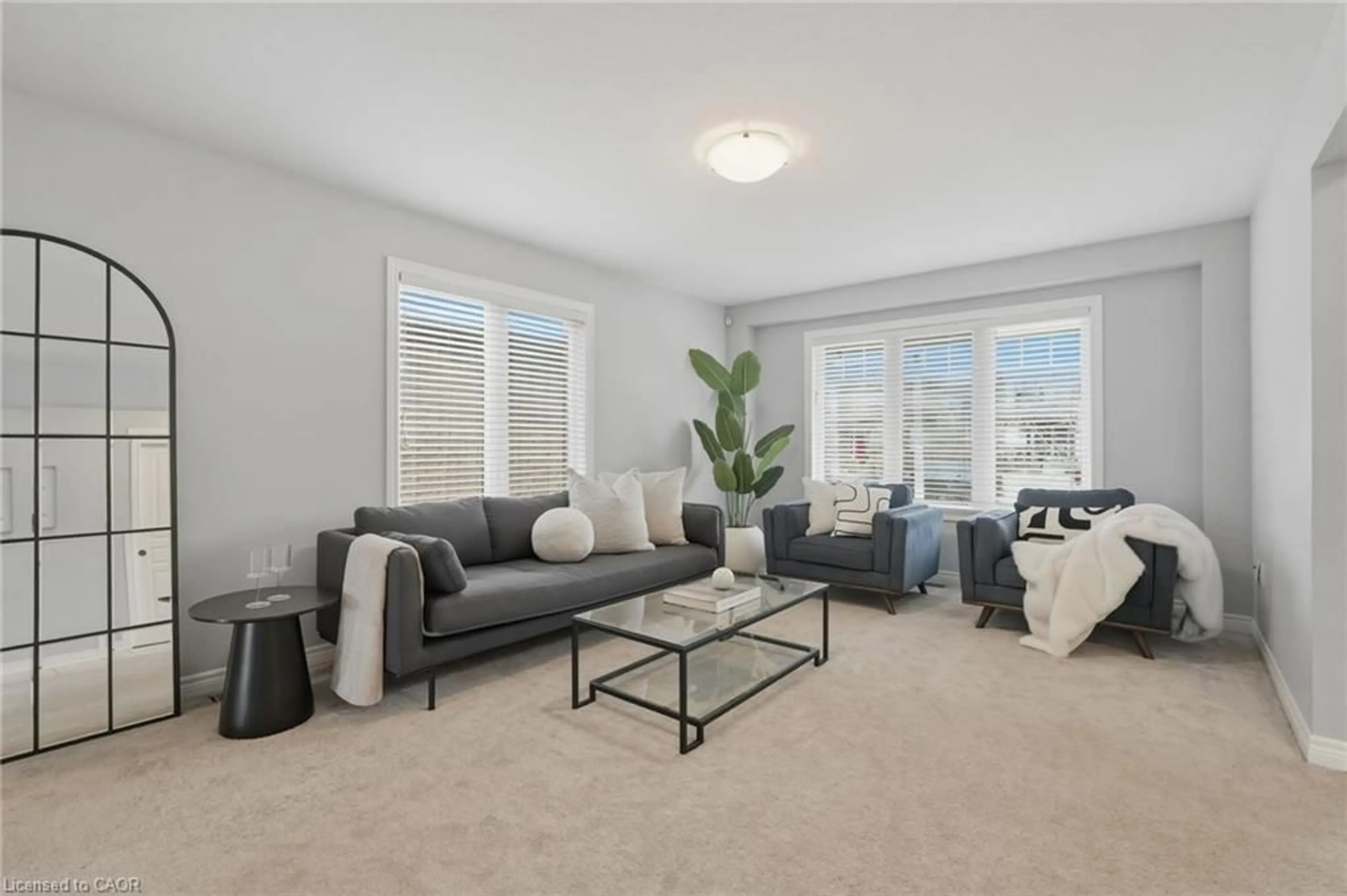 Living room with furniture, carpet floor for 4021 Bush Cres, Beamsville Ontario L3J 0H2