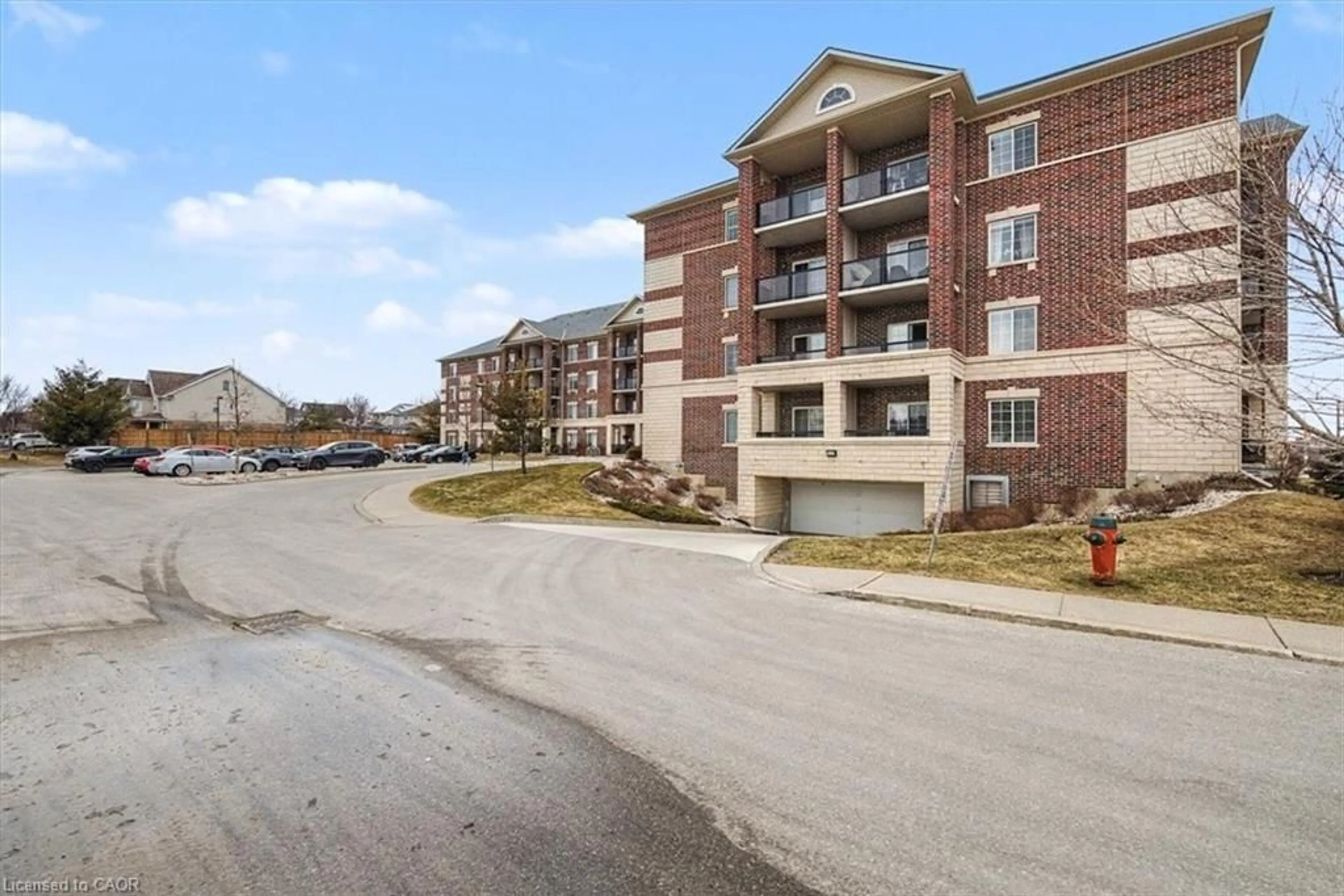 A pic from outside/outdoor area/front of a property/back of a property/a pic from drone, unknown for 308 Watson Pky #412, Guelph Ontario N1E 0G7