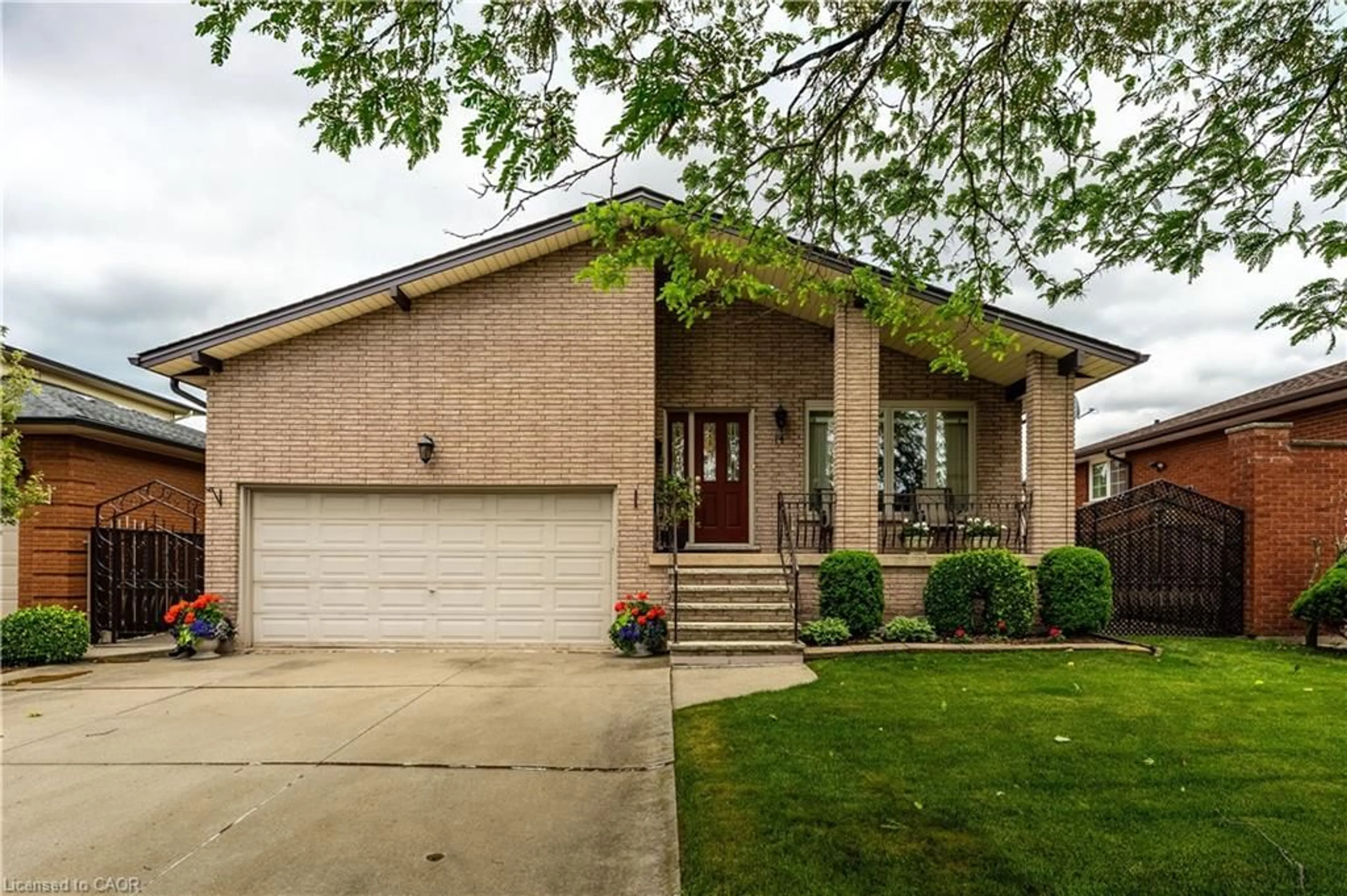 Home with brick exterior material, street for 14 Valrose Dr, Hamilton Ontario L8E 3T4