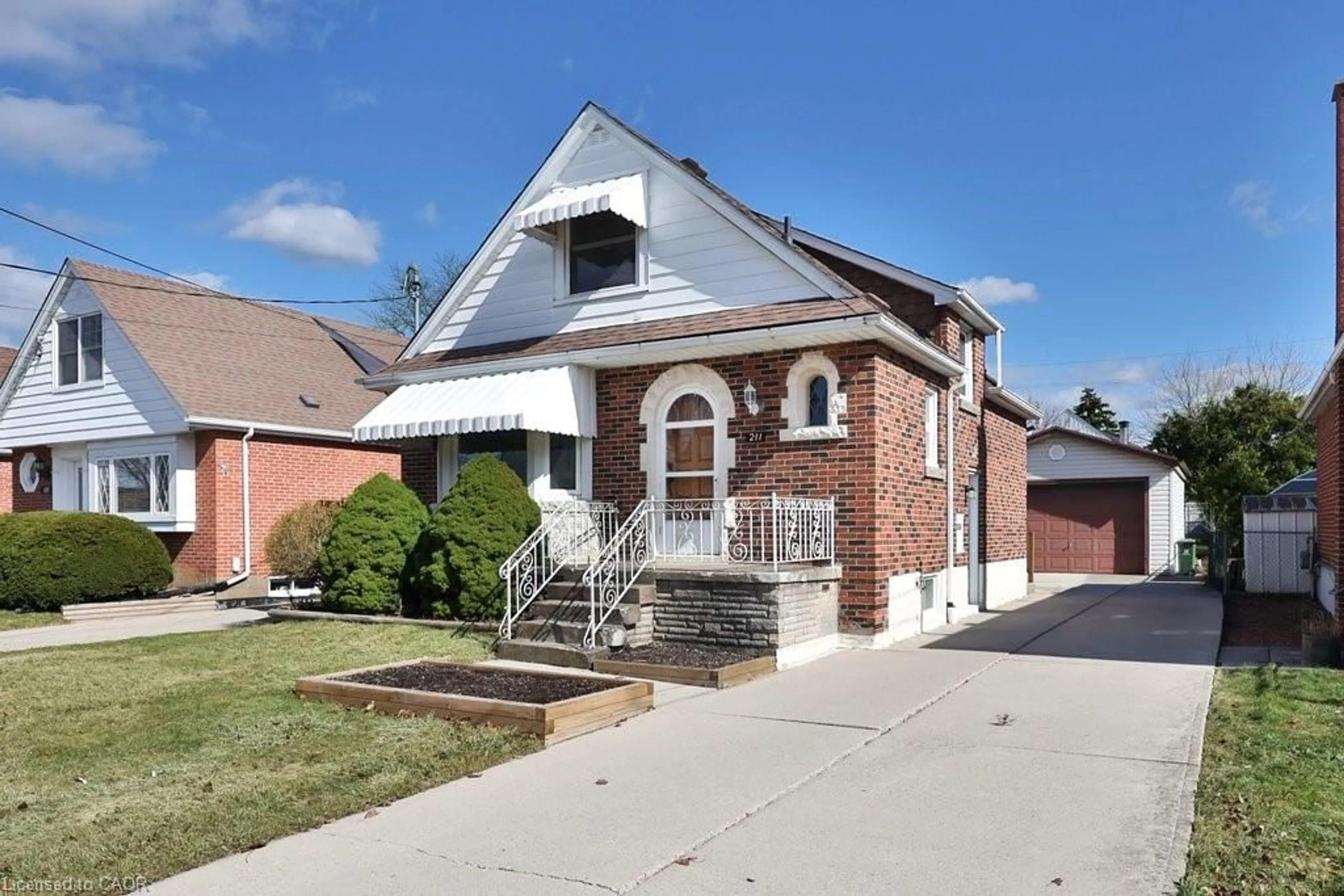 Home with brick exterior material, street for 211 Glencairn Ave, Hamilton Ontario L8K 3P1