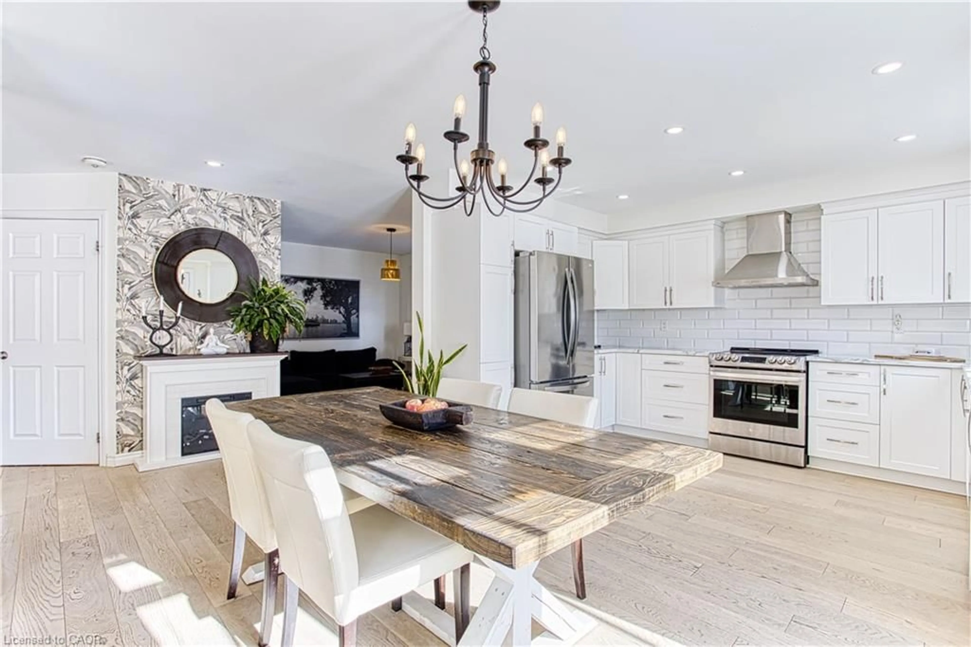 Open concept kitchen, wood/laminate floor for 32 Hudson Dr, Cayuga Ontario N0A 1E0