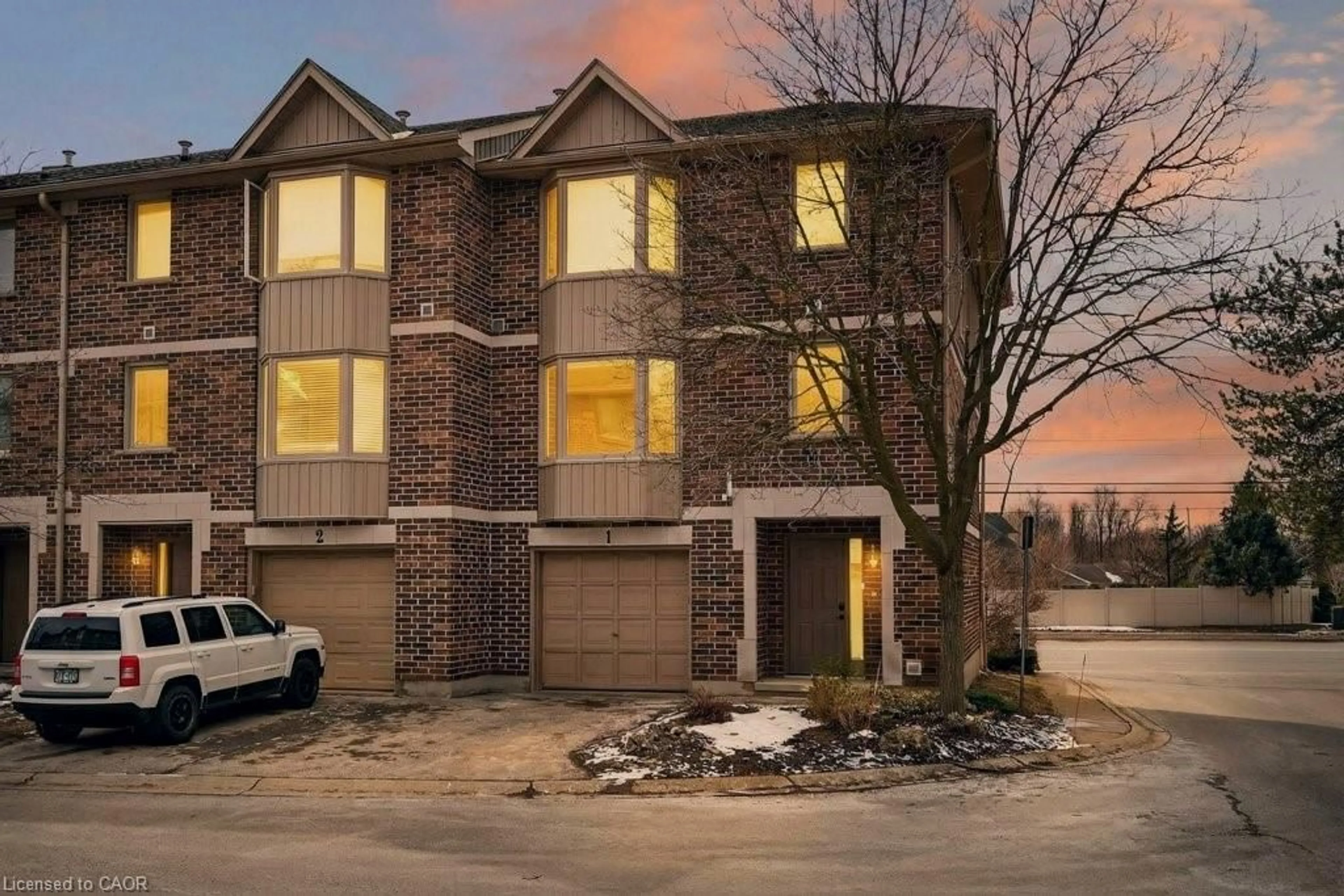Home with brick exterior material, street for 1548 Richmond St #1, London Ontario N6G 4W7