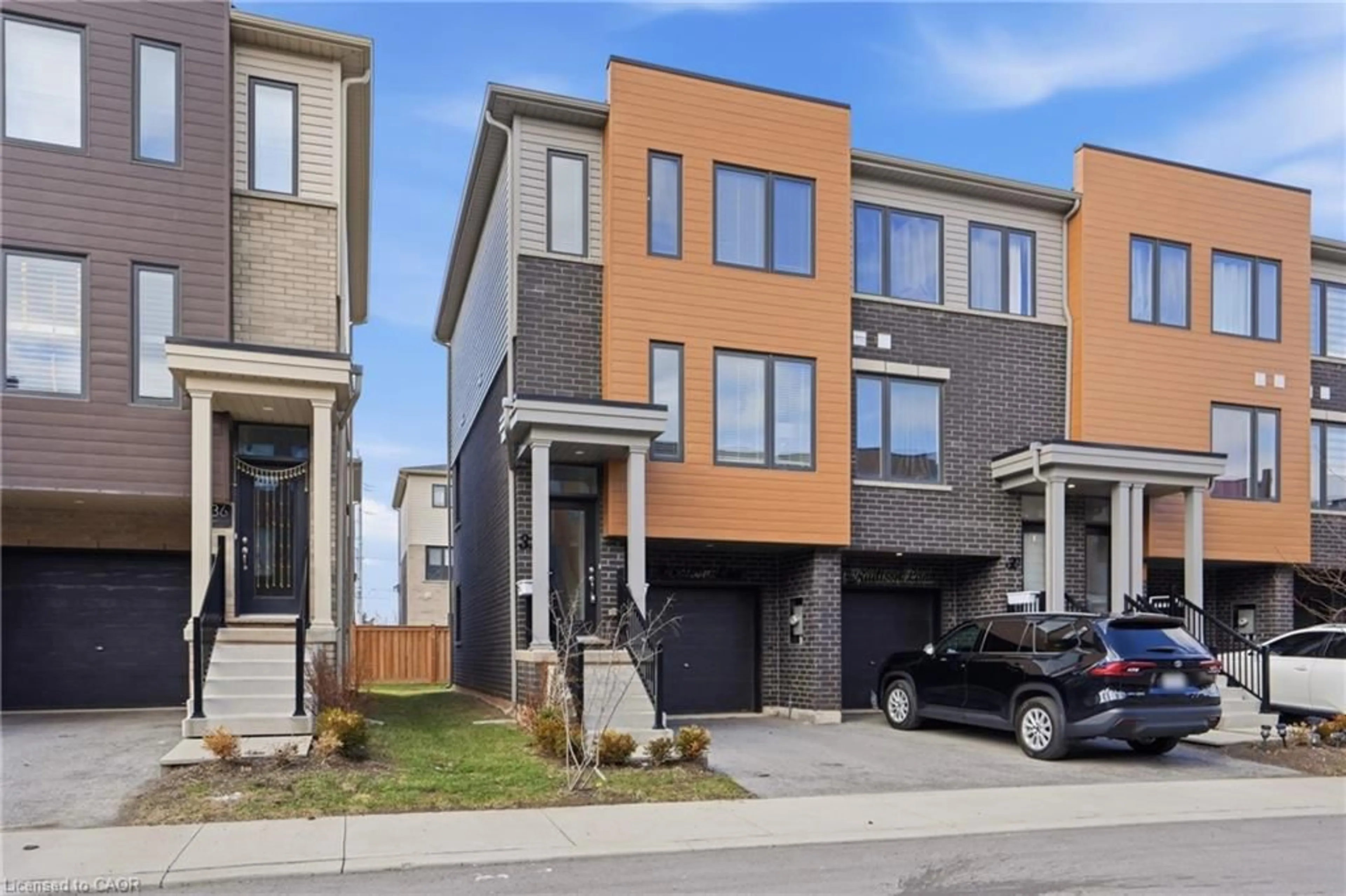 Home with brick exterior material, street for 32 Radison Lane, Hamilton Ontario L8H 0B5