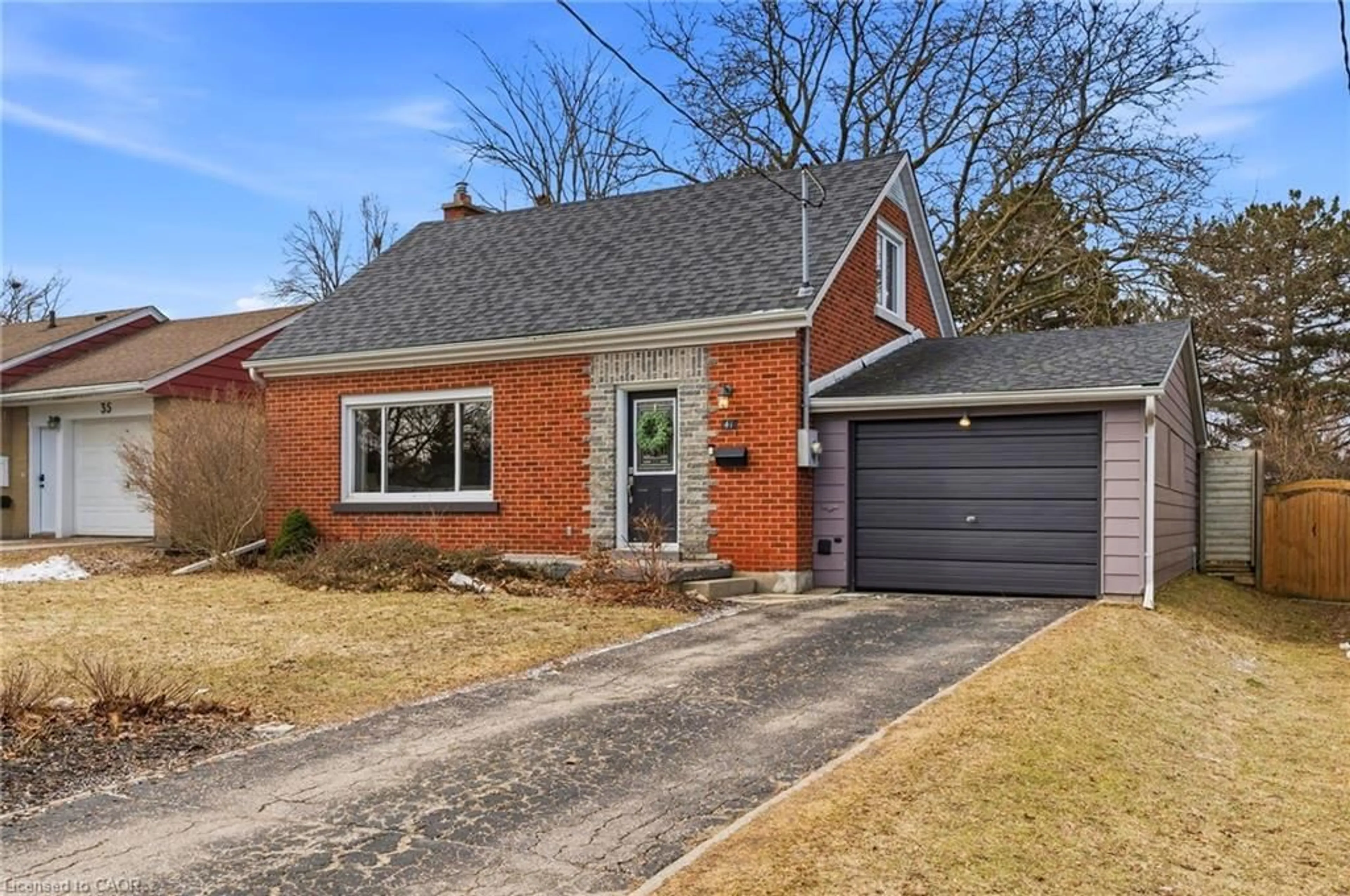 Home with brick exterior material, street for 41 Ridgewood Ave, Kitchener Ontario N2H 4L1