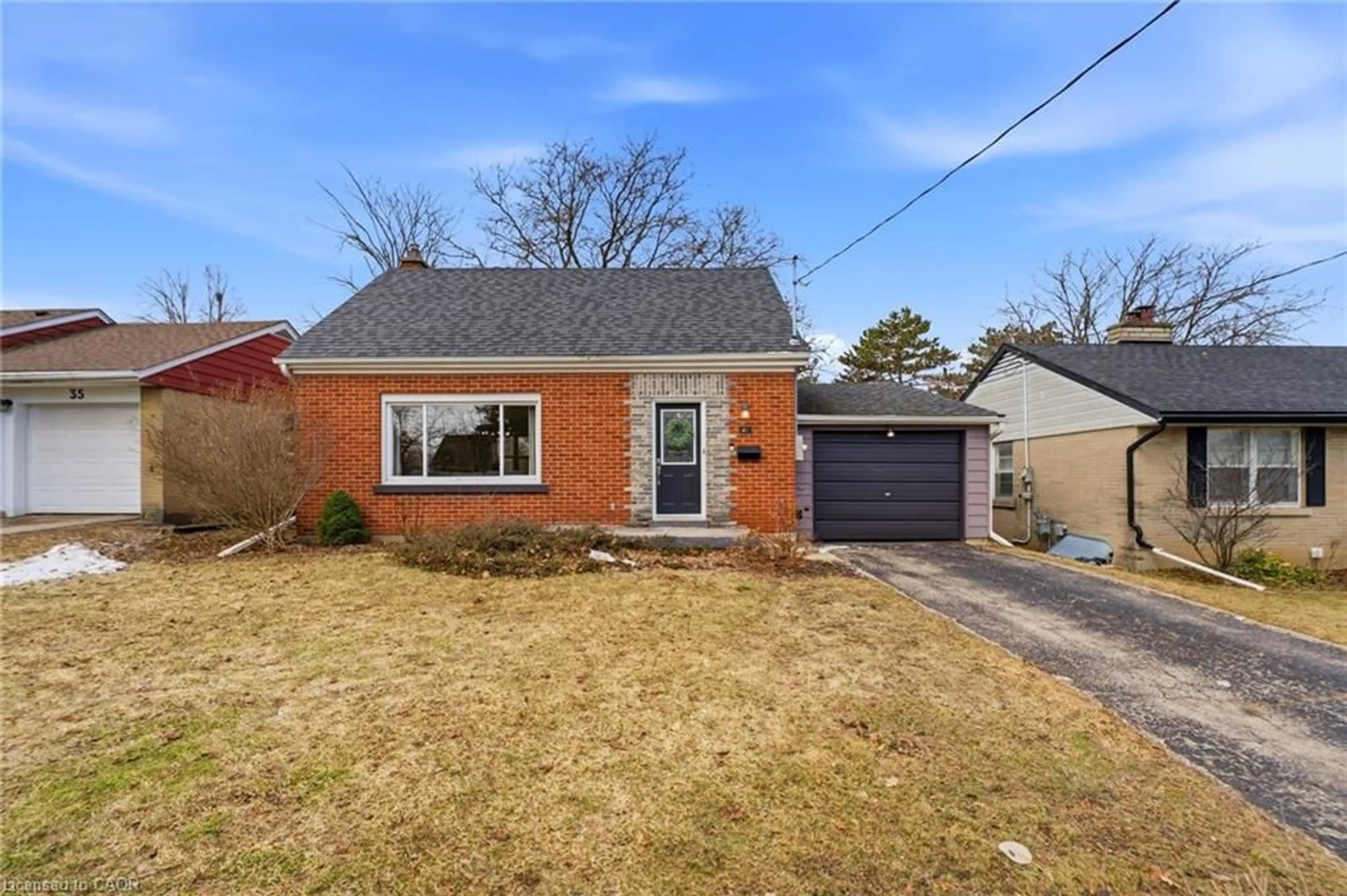 Home with brick exterior material, street for 41 Ridgewood Ave, Kitchener Ontario N2H 4L1