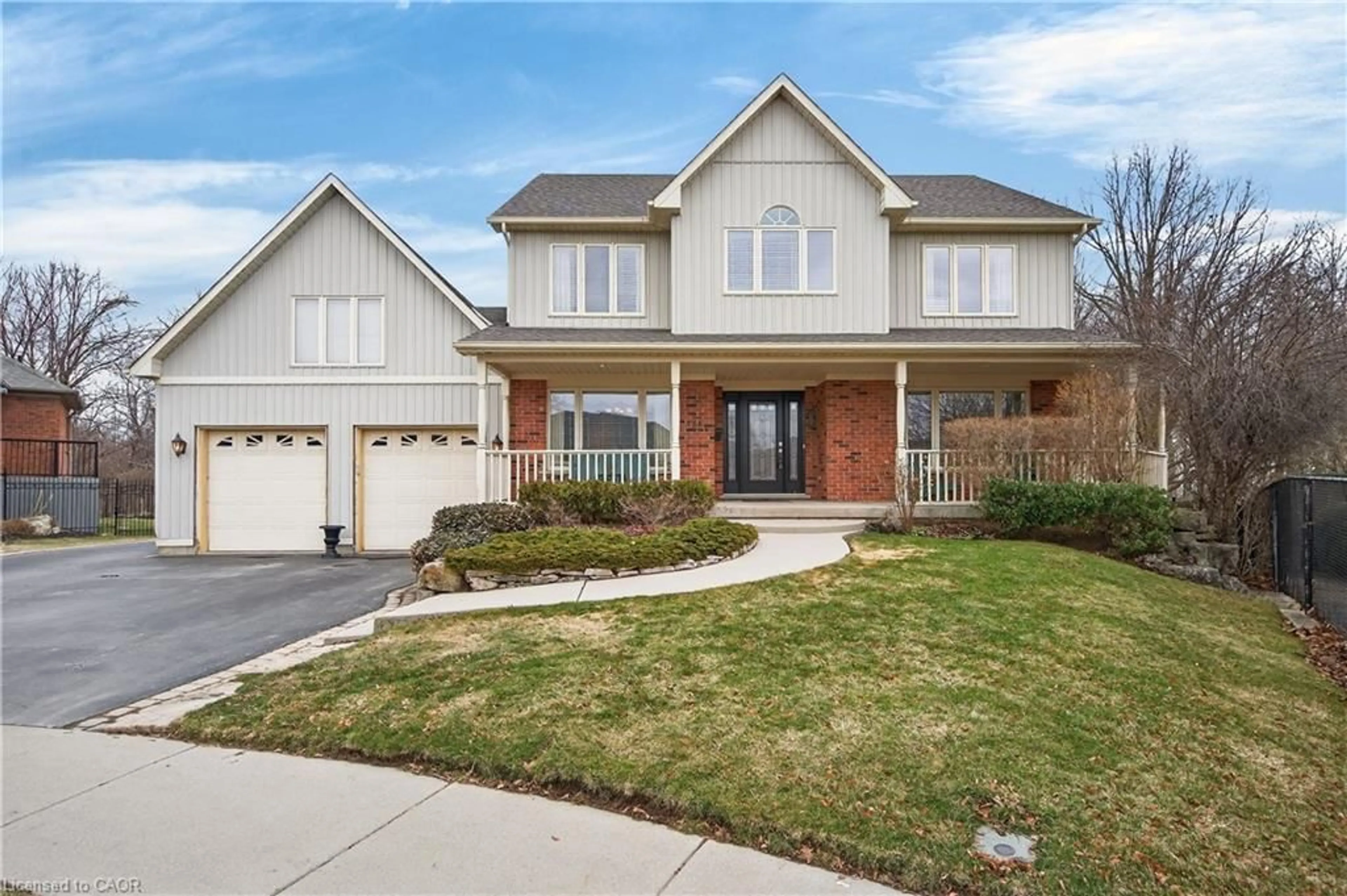 Home with brick exterior material, street for 136 Grindstone Way, Waterdown Ontario L9H 7B8