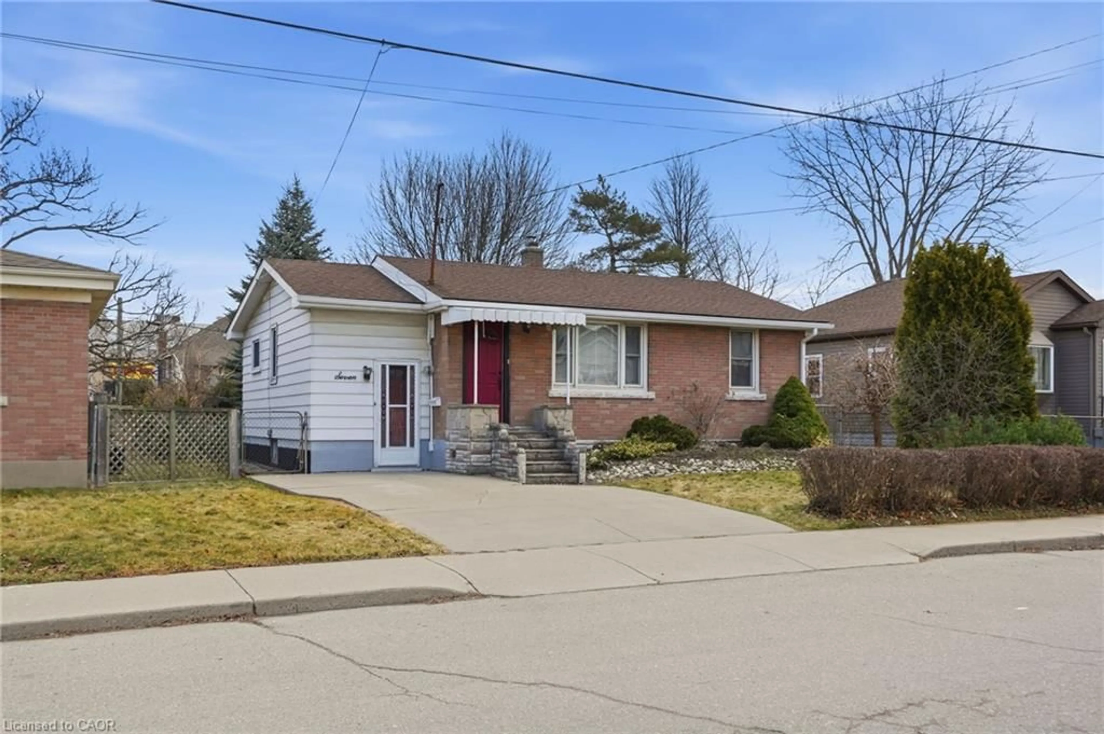 Home with brick exterior material, street for 7 West 1st St, Hamilton Ontario L9C 3B5