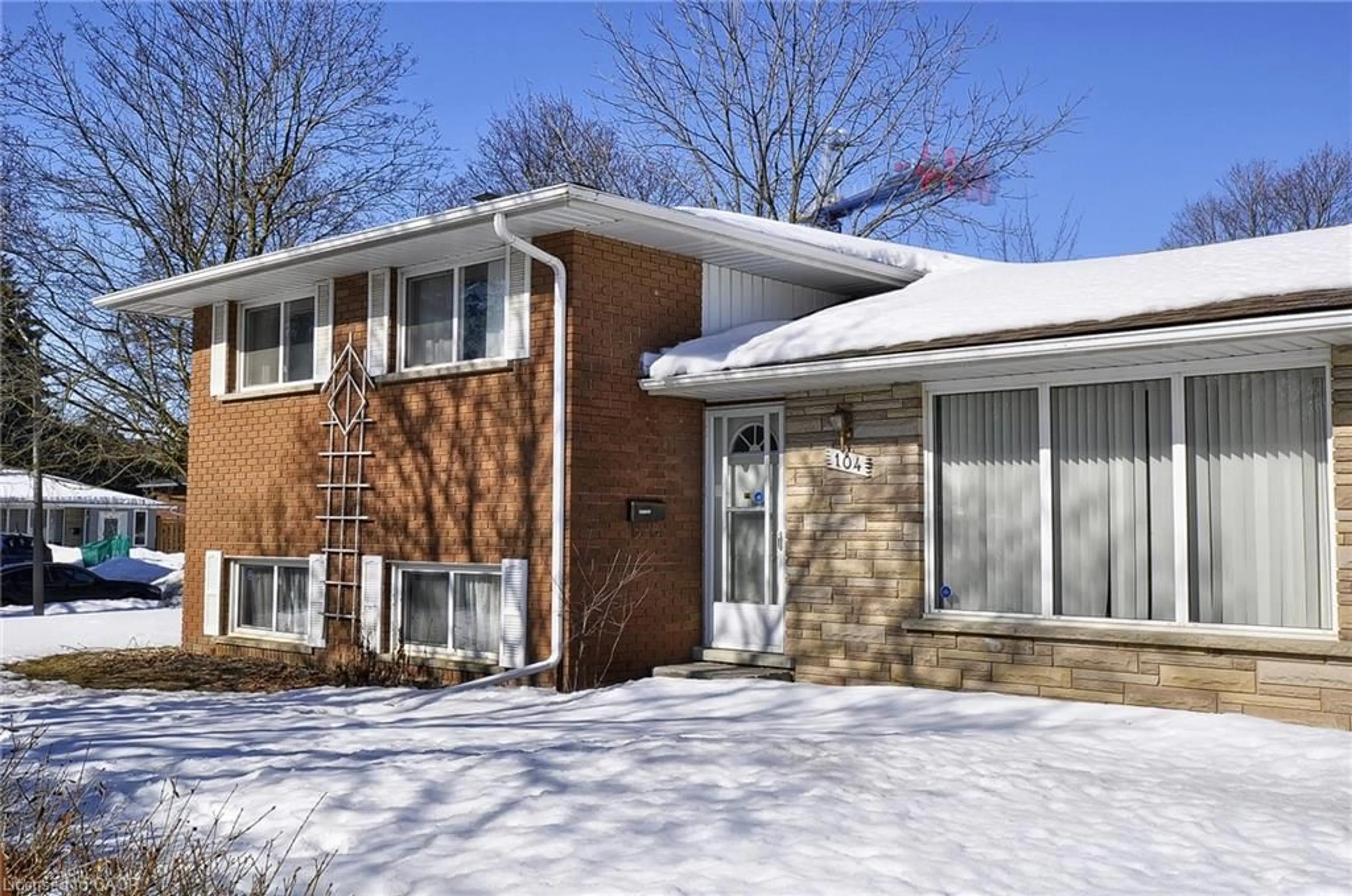 Home with brick exterior material, street for 104 Milford Ave, Waterloo Ontario N2L 3Z3