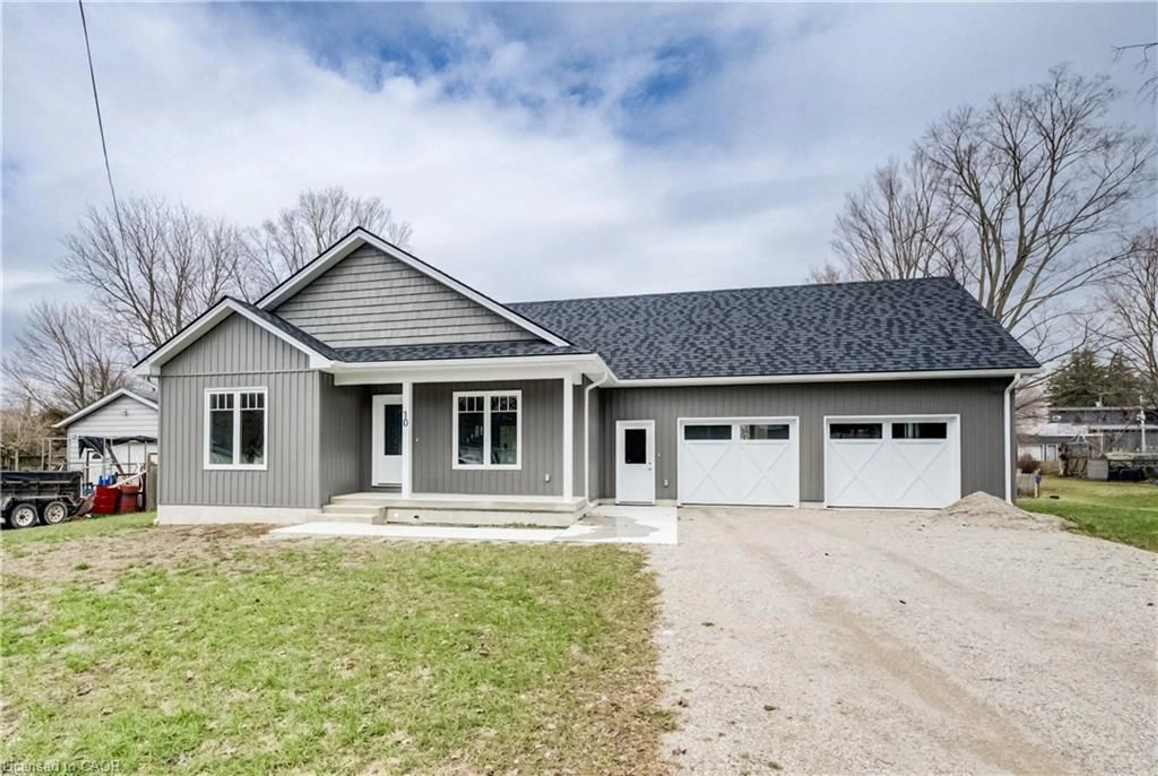 Home with vinyl exterior material, street for 10 Mill St, Otterville Ontario N0J 1R0