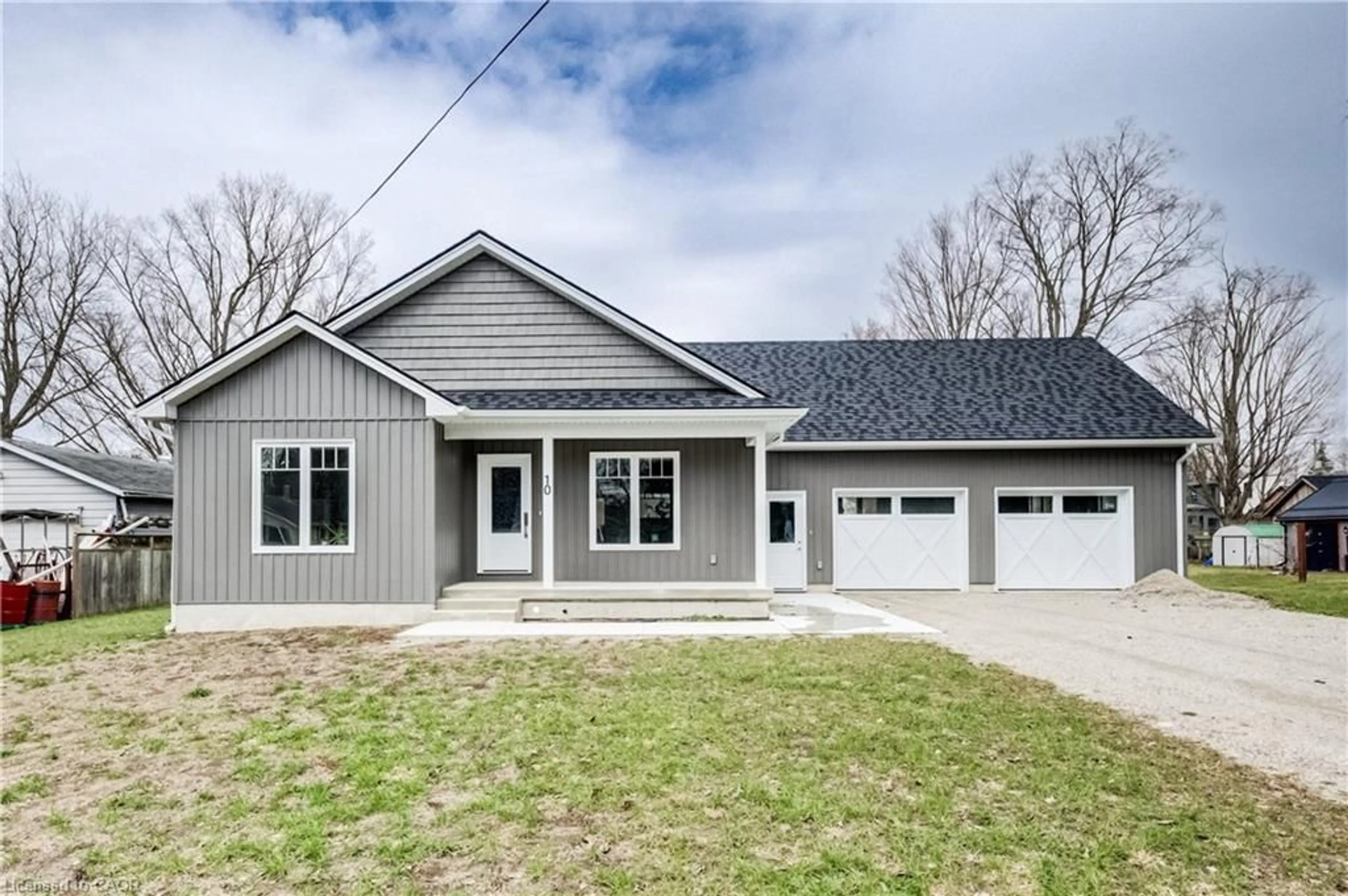 Home with vinyl exterior material, street for 10 Mill St, Otterville Ontario N0J 1R0