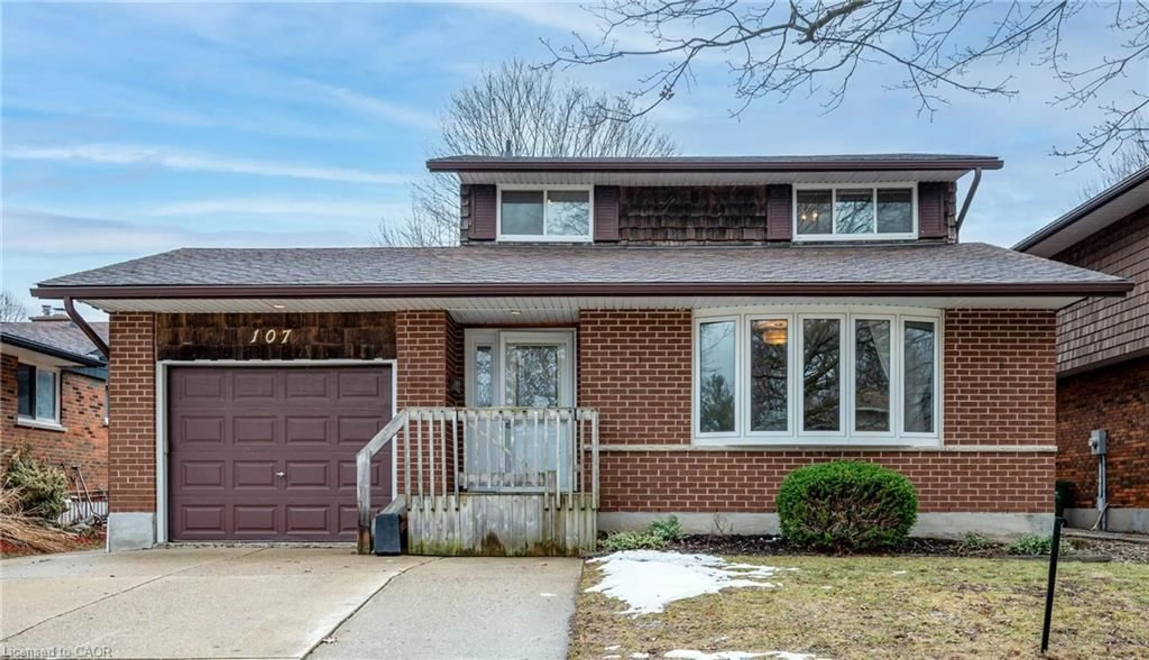 Home with brick exterior material, street for 107 Dunsmere Dr, Kitchener Ontario N2E 1W4