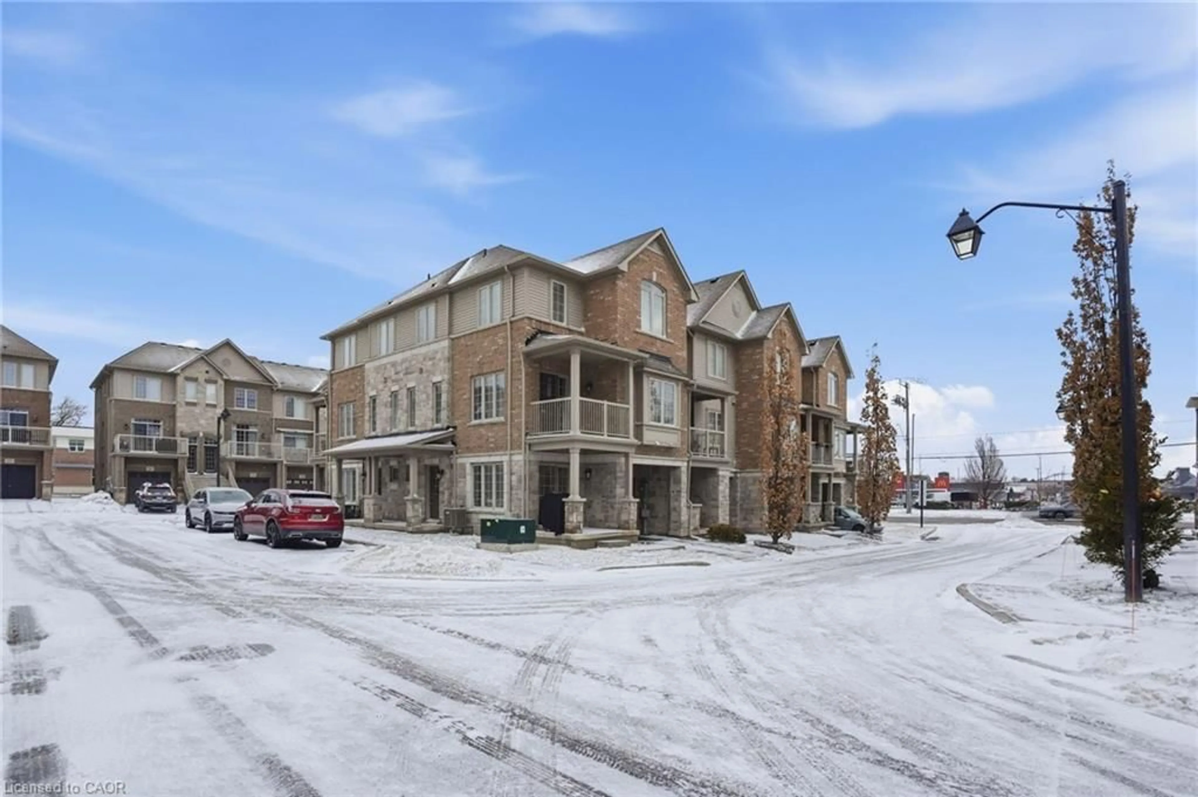 A pic from outside/outdoor area/front of a property/back of a property/a pic from drone, street for 257 Parkside Dr #33, Waterdown Ontario L8B 0W5