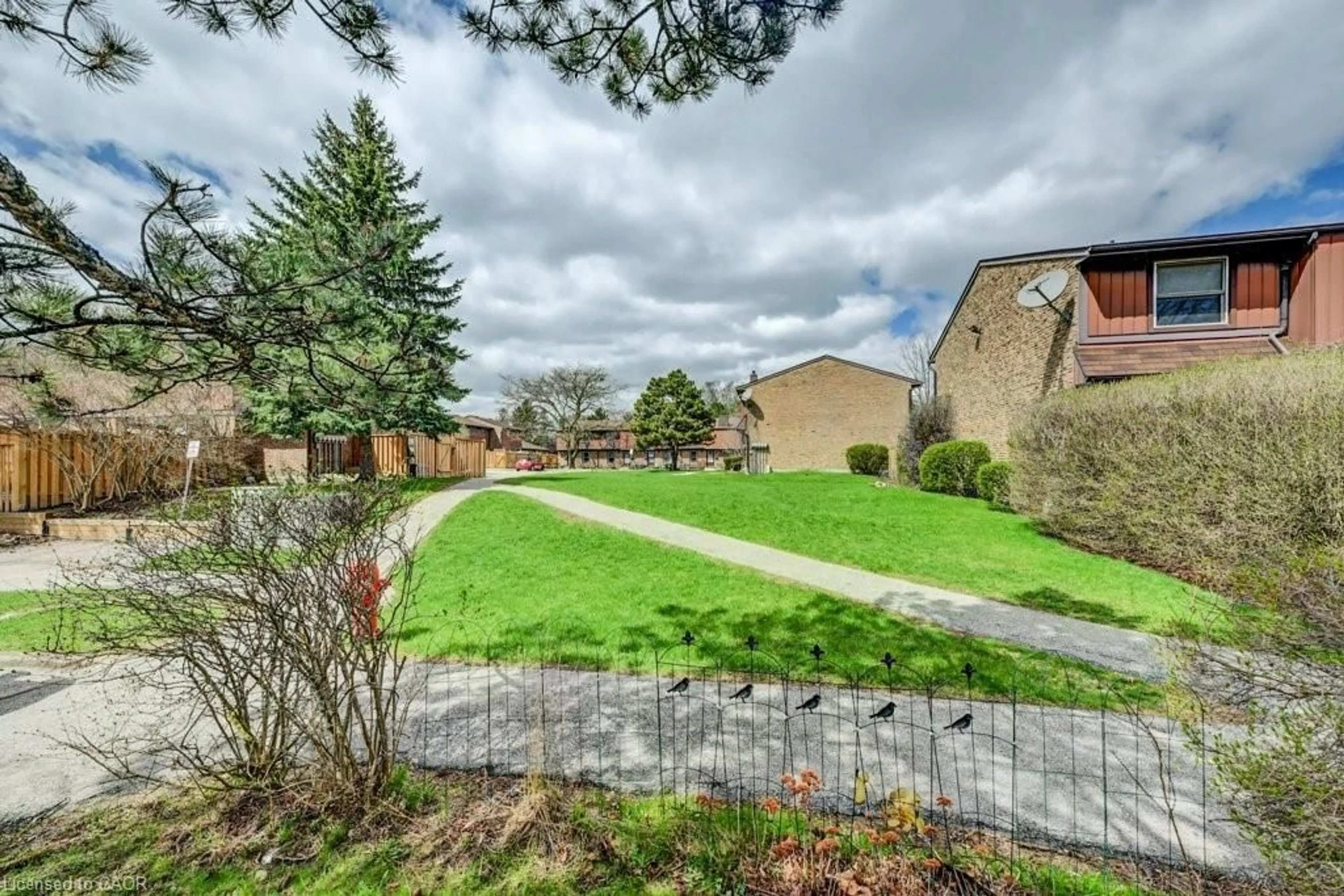 A pic from outside/outdoor area/front of a property/back of a property/a pic from drone, mountain view for 235 Ferguson Ave #45, Cambridge Ontario N1R 6G1