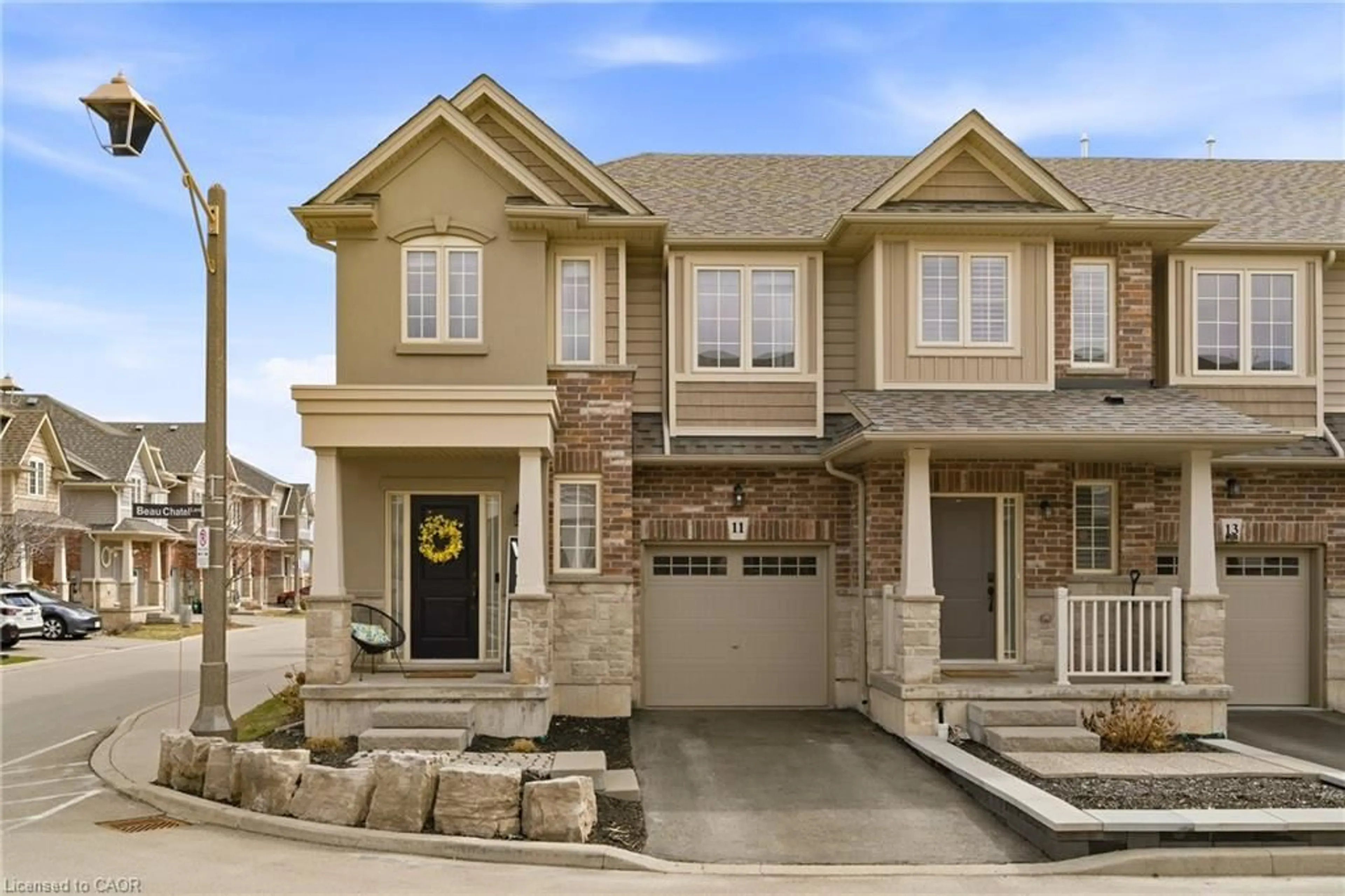 Home with brick exterior material, street for 11 Beau Chatel Lane, Grimsby Ontario L3M 0H4