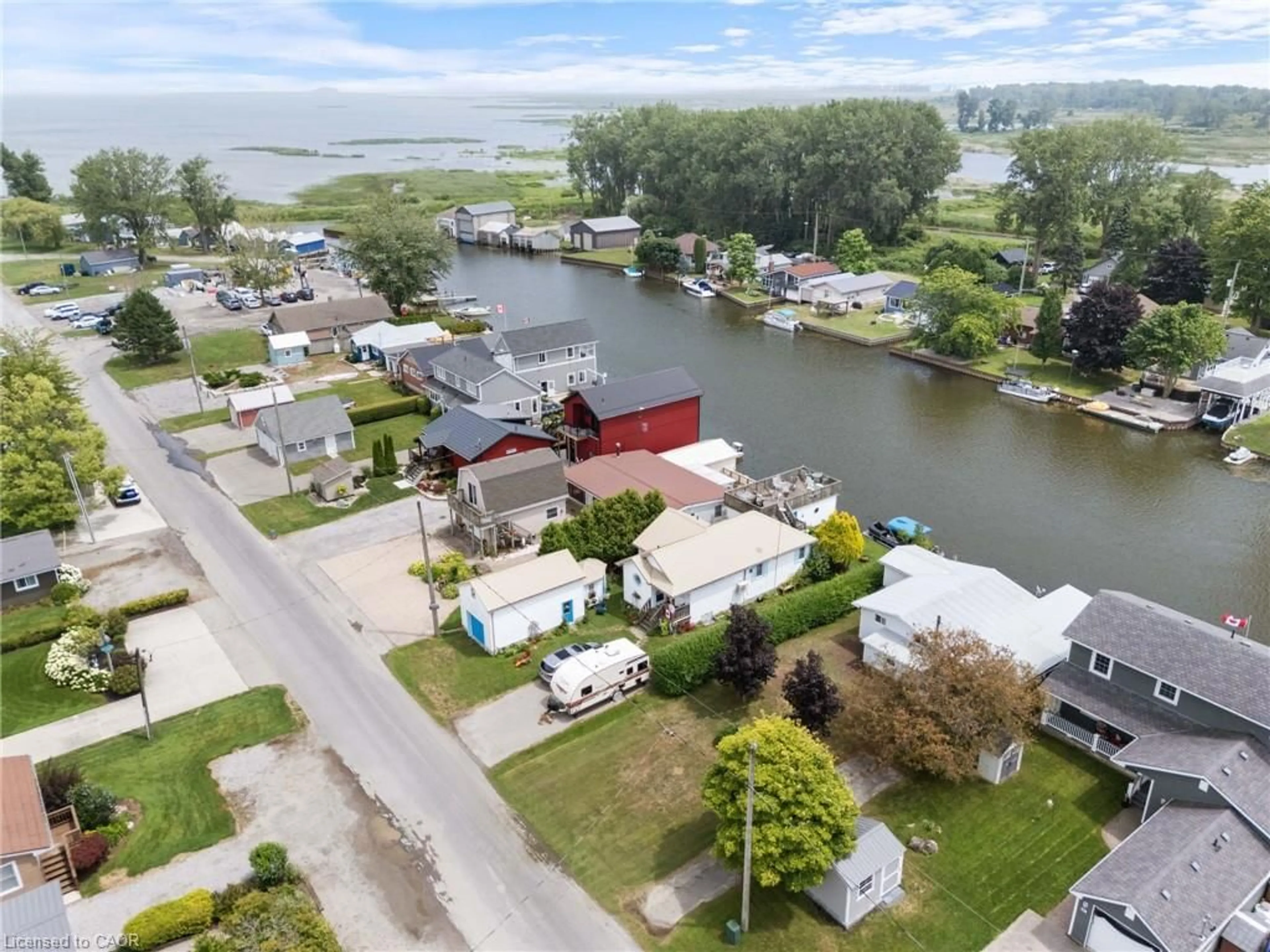 A pic from outside/outdoor area/front of a property/back of a property/a pic from drone, water/lake/river/ocean view for 23 Rogers Ave, Long Point Ontario N0E 1M0