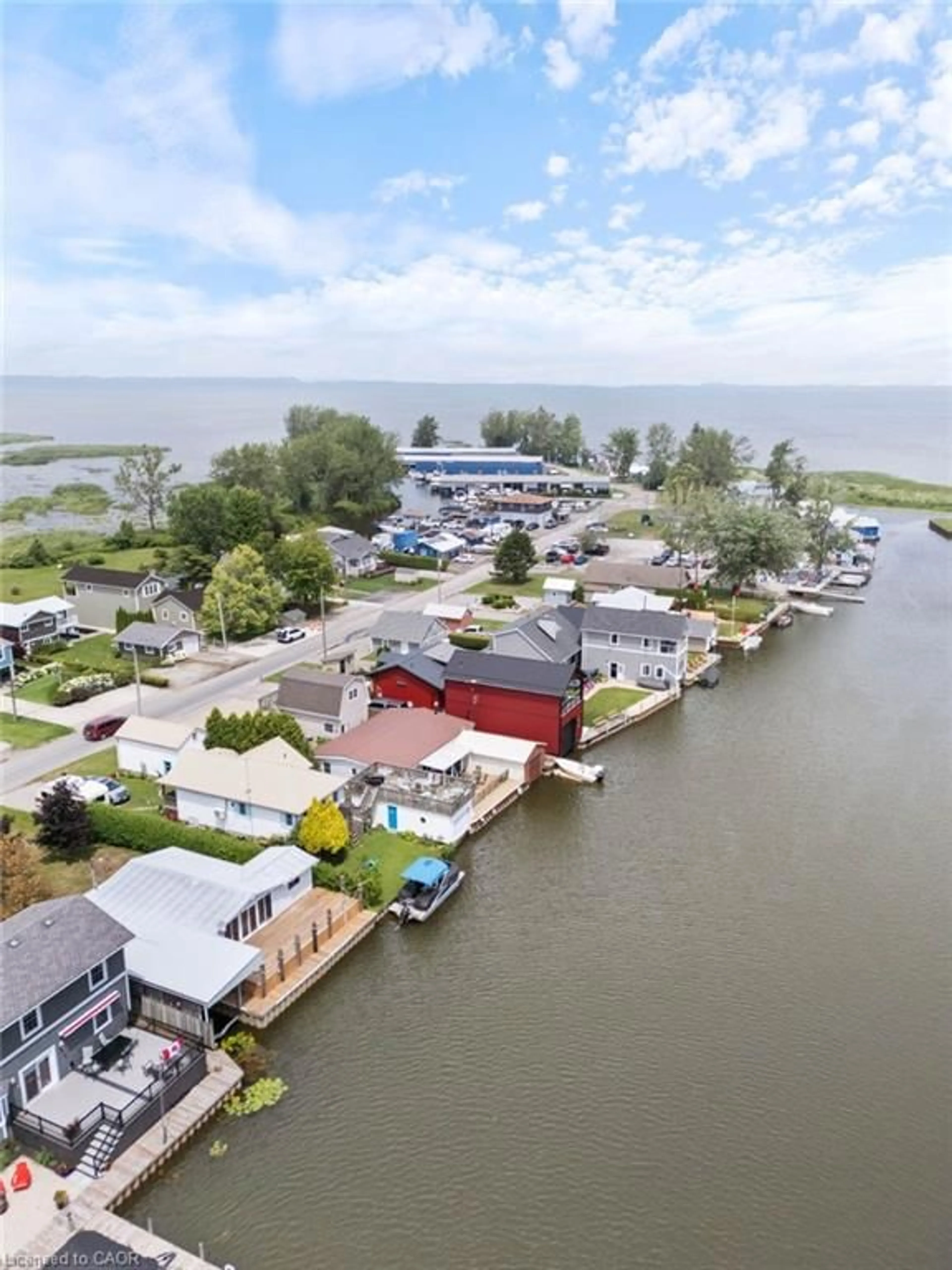 A pic from outside/outdoor area/front of a property/back of a property/a pic from drone, water/lake/river/ocean view for 23 Rogers Ave, Long Point Ontario N0E 1M0