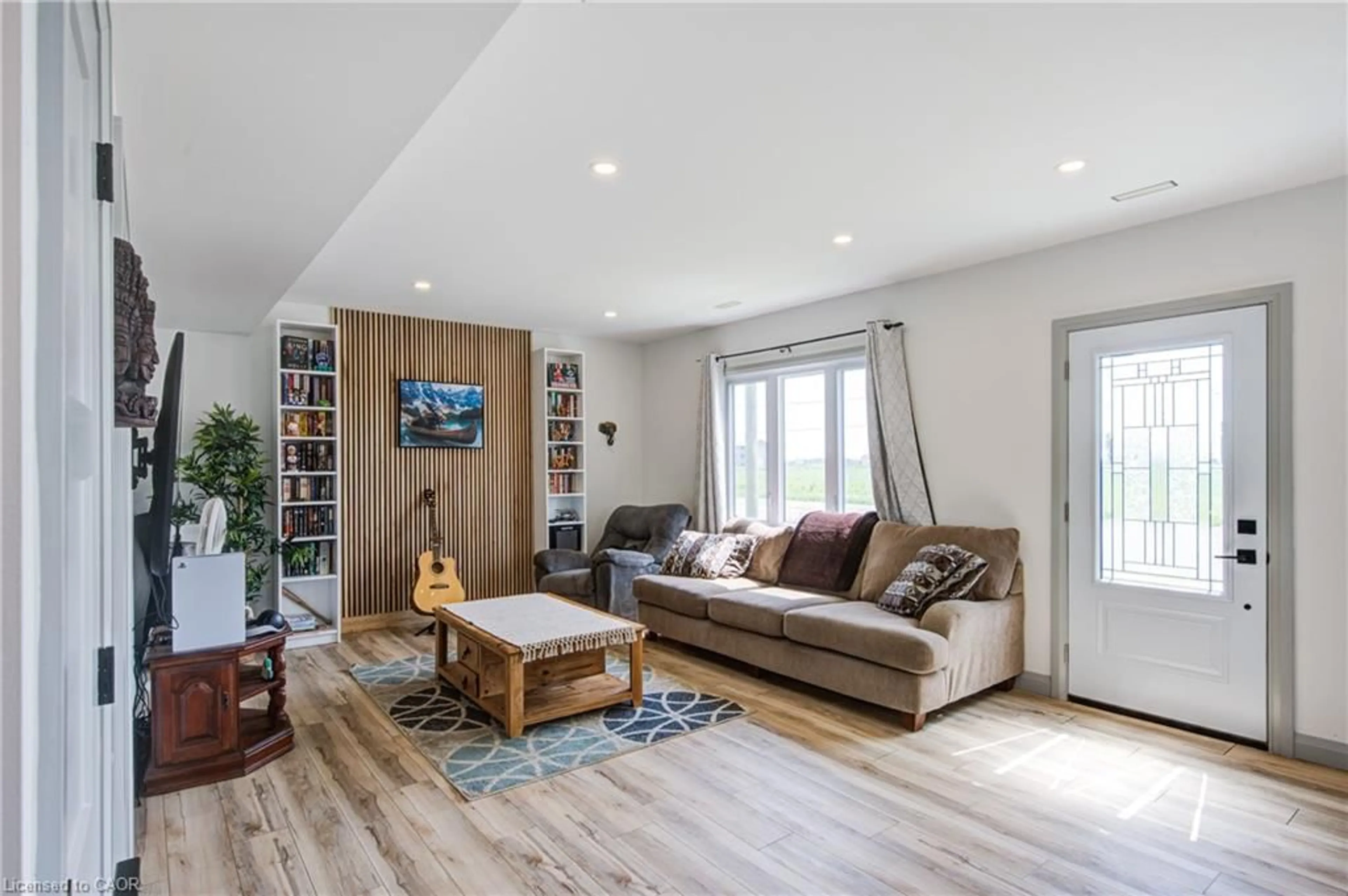 Living room with furniture, wood/laminate floor for 140 Winstanley St, Monkton Ontario N0K 1P0