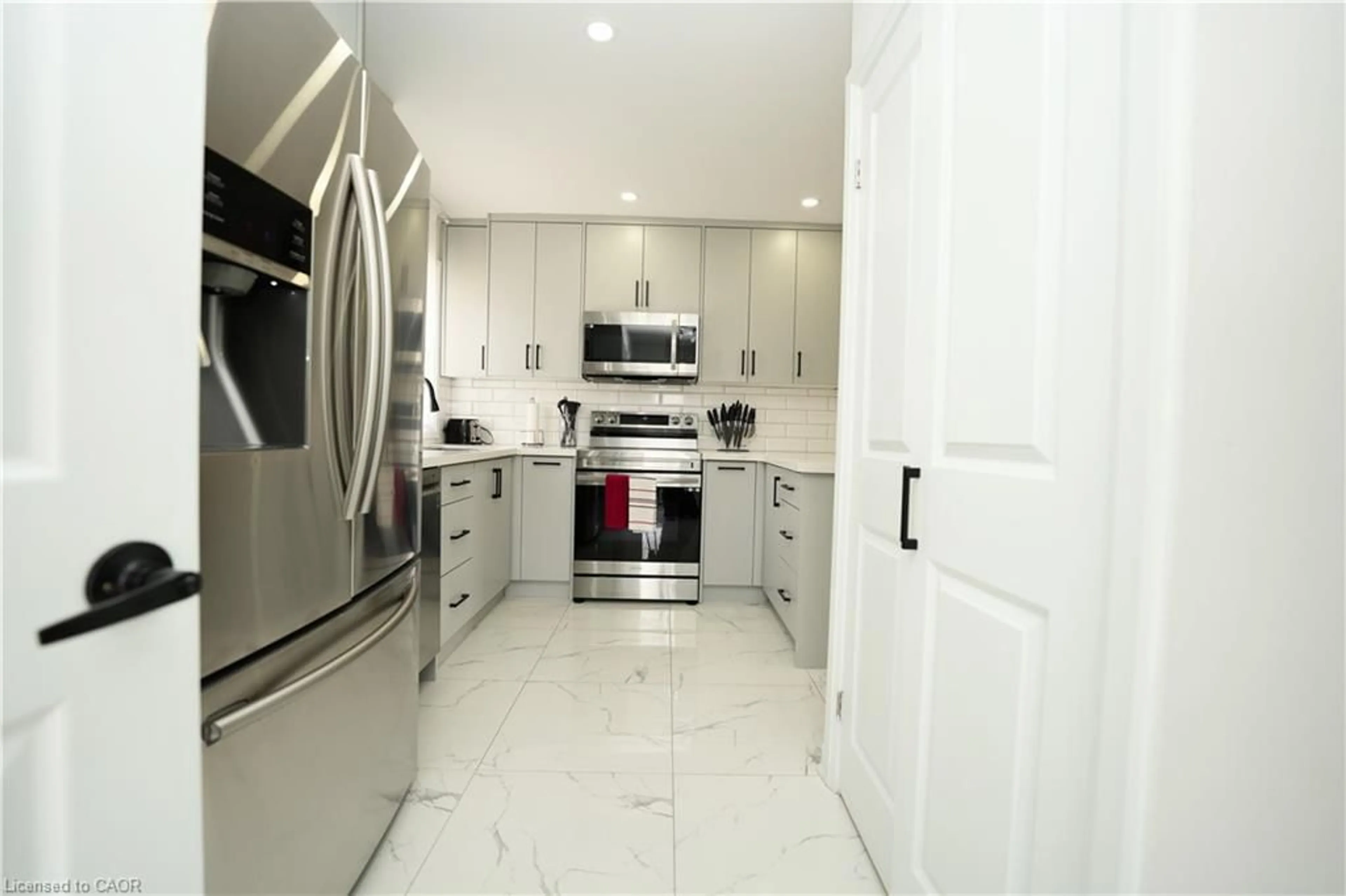 Contemporary kitchen, ceramic/tile floor for 140 Jansen Ave, Kitchener Ontario N2A 2L7