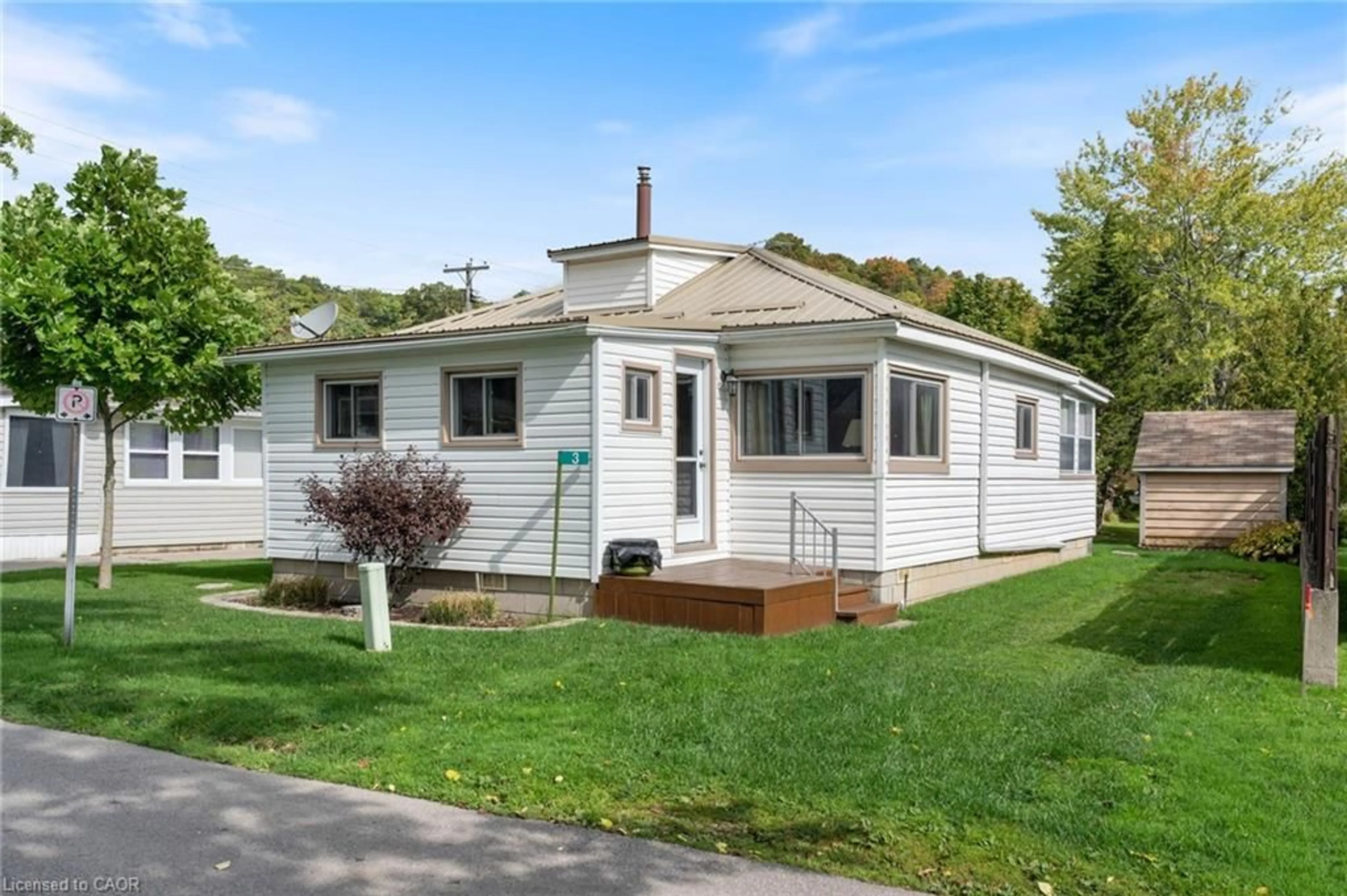 Home with vinyl exterior material, street for 3 Harold St, Turkey Point Ontario N0E 1T0