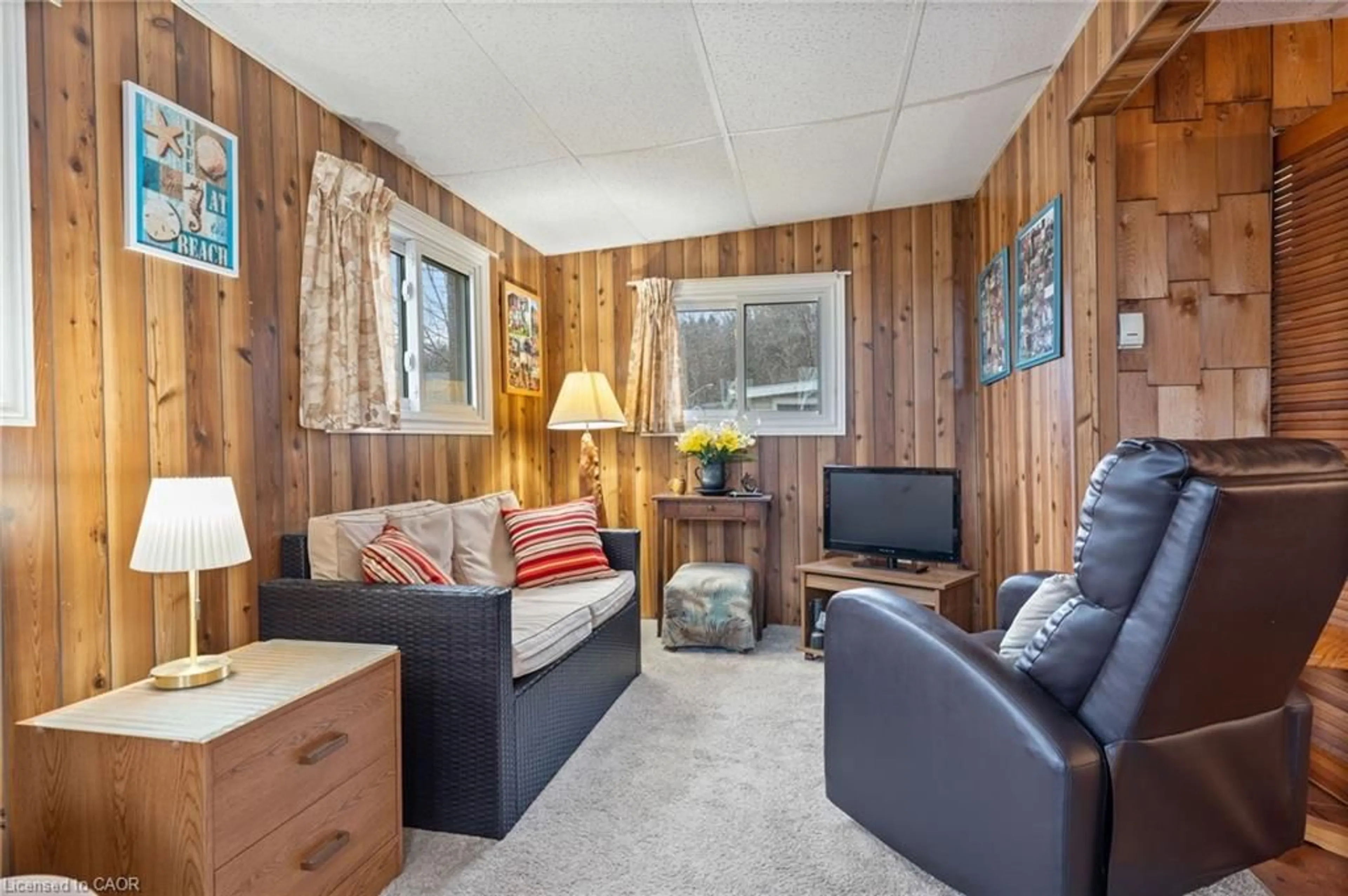 Living room with furniture, unknown for 3 Harold St, Turkey Point Ontario N0E 1T0