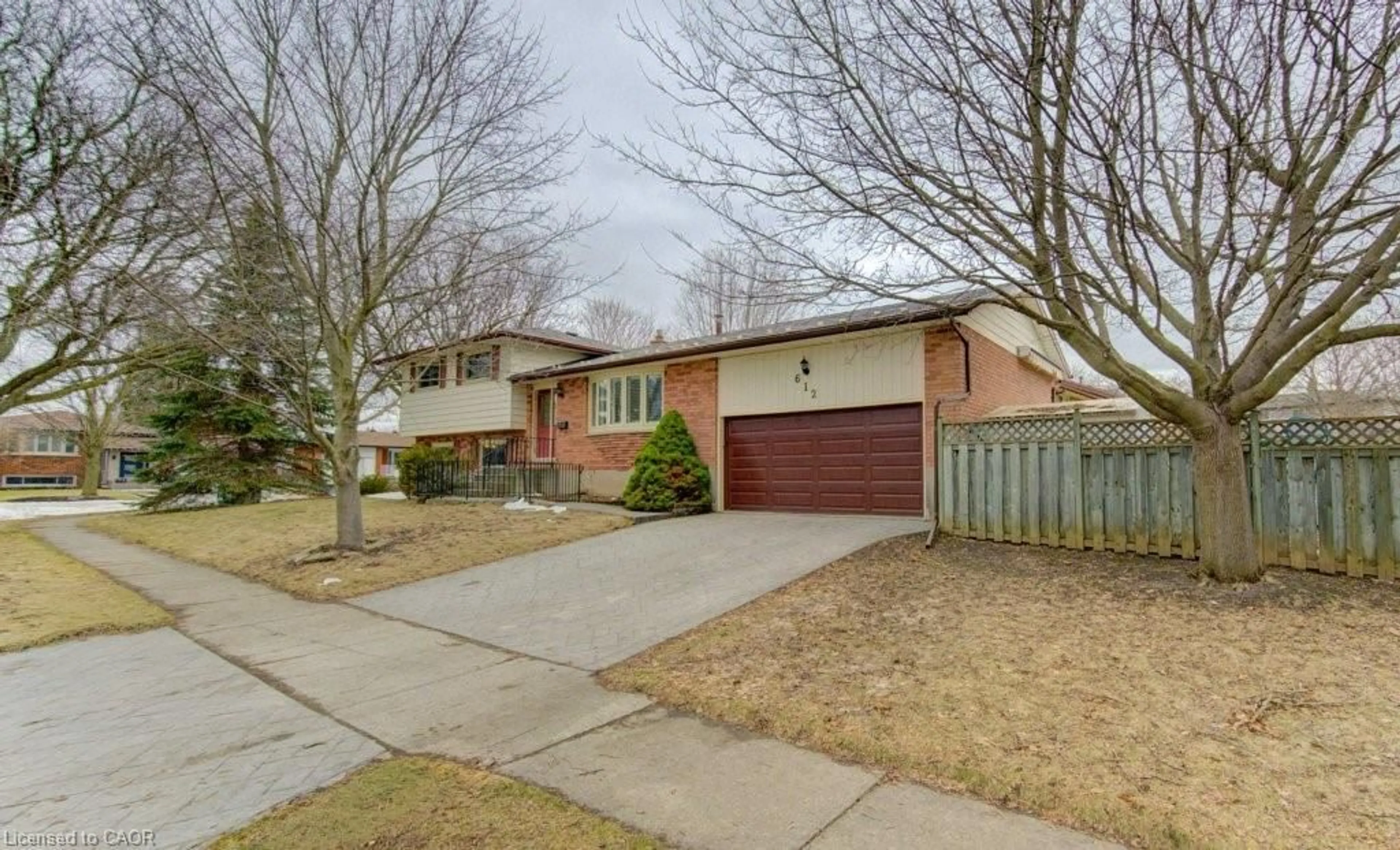 Home with brick exterior material, street for 612 Green Meadow Cres, Waterloo Ontario N2V 1E2