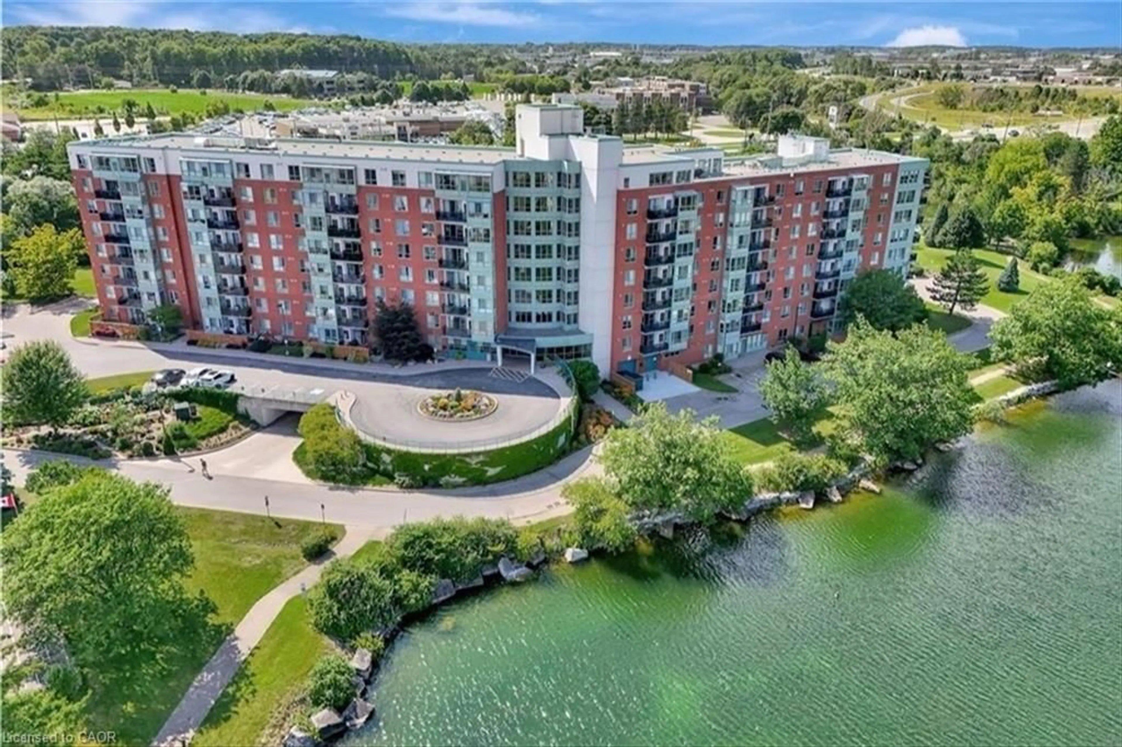 A pic from outside/outdoor area/front of a property/back of a property/a pic from drone, water/lake/river/ocean view for 30 Blue Springs Dr #706, Waterloo Ontario N2J 4T2