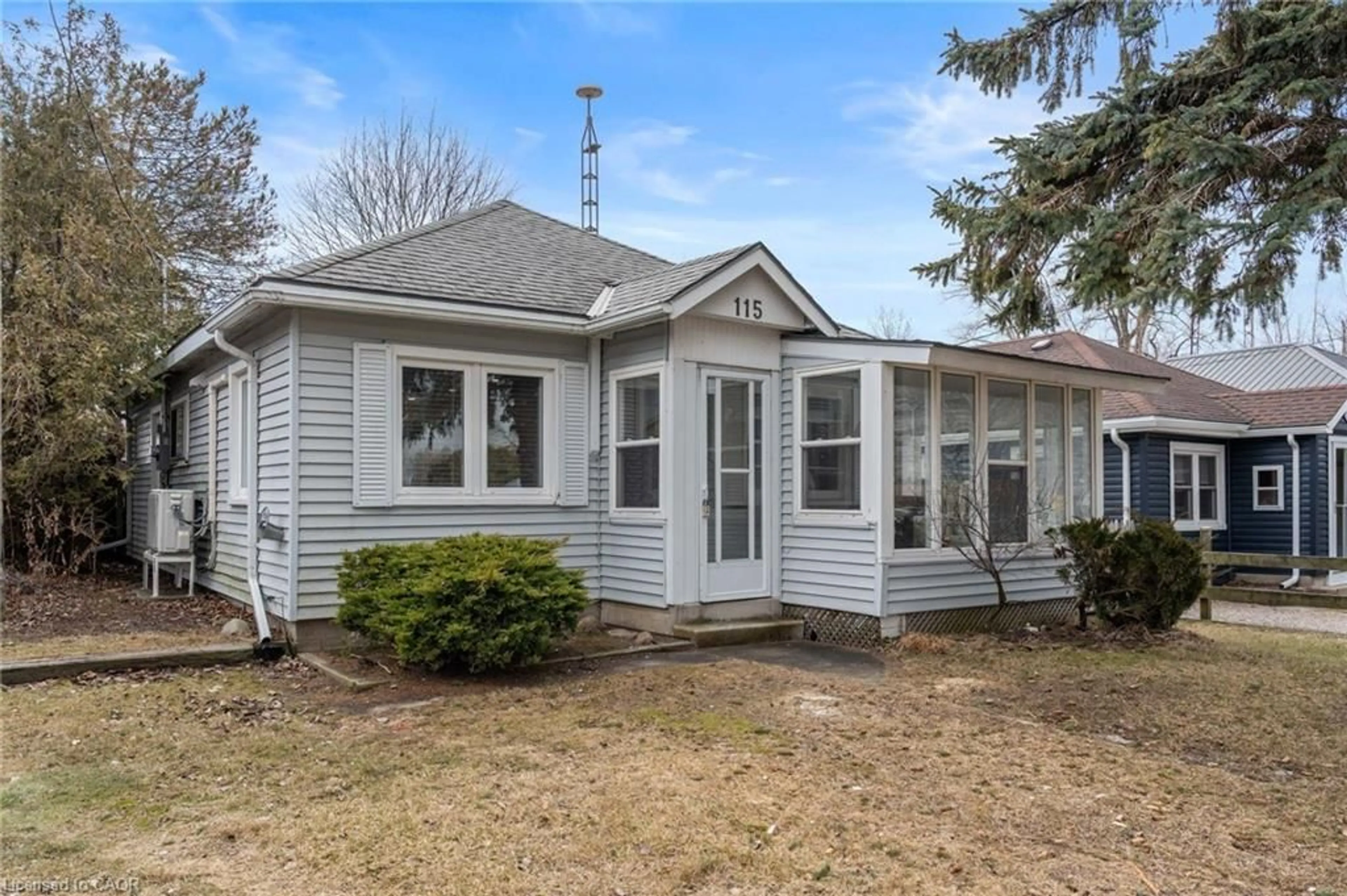 Home with vinyl exterior material, street for 115 Erie Blvd, Long Point Ontario N0E 1M0