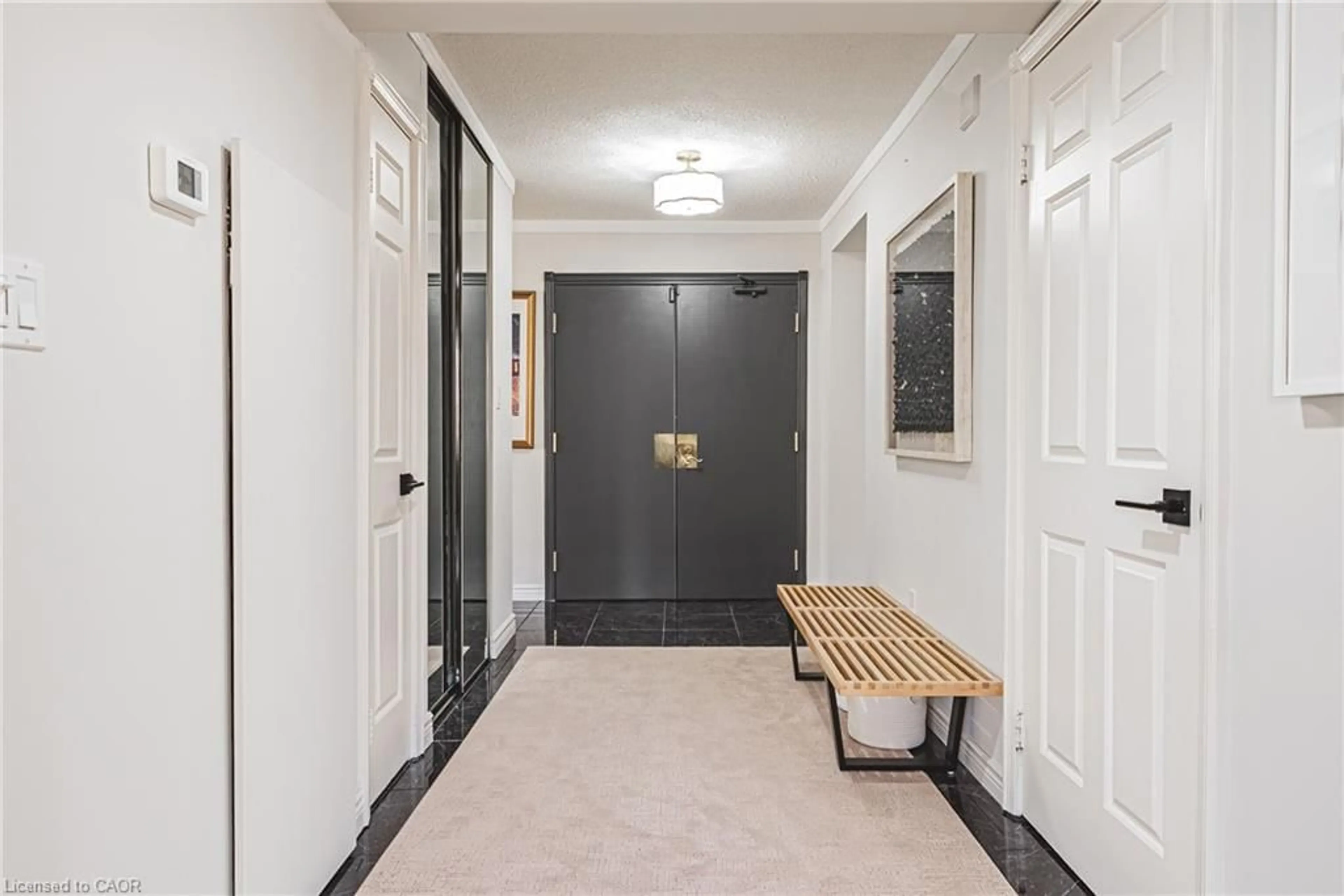 Indoor entryway for 49 Robinson St #200, Hamilton Ontario L8P 1Y7