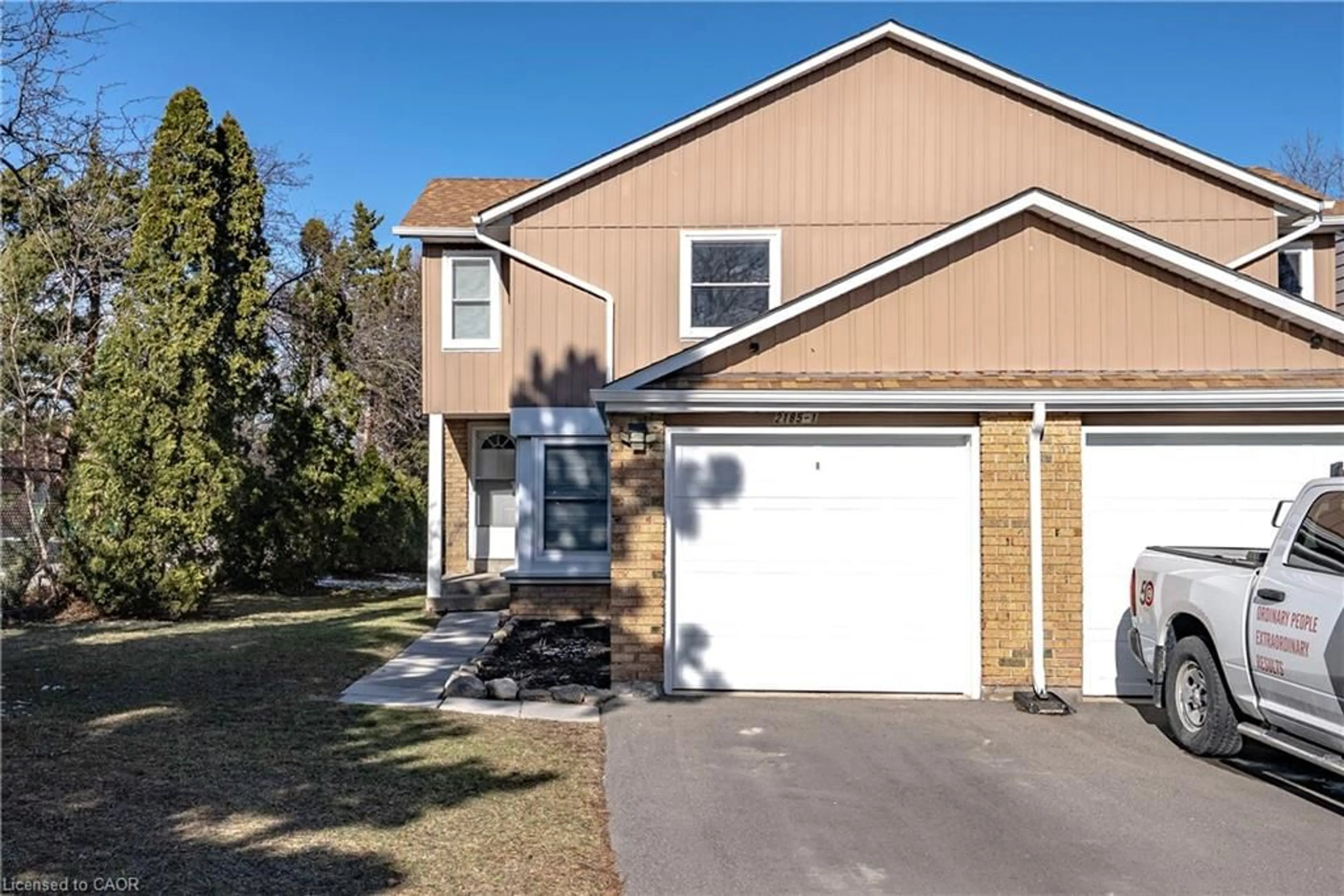 Home with vinyl exterior material, street for 2185 Fairchild Blvd #1, Burlington Ontario L7P 3P6
