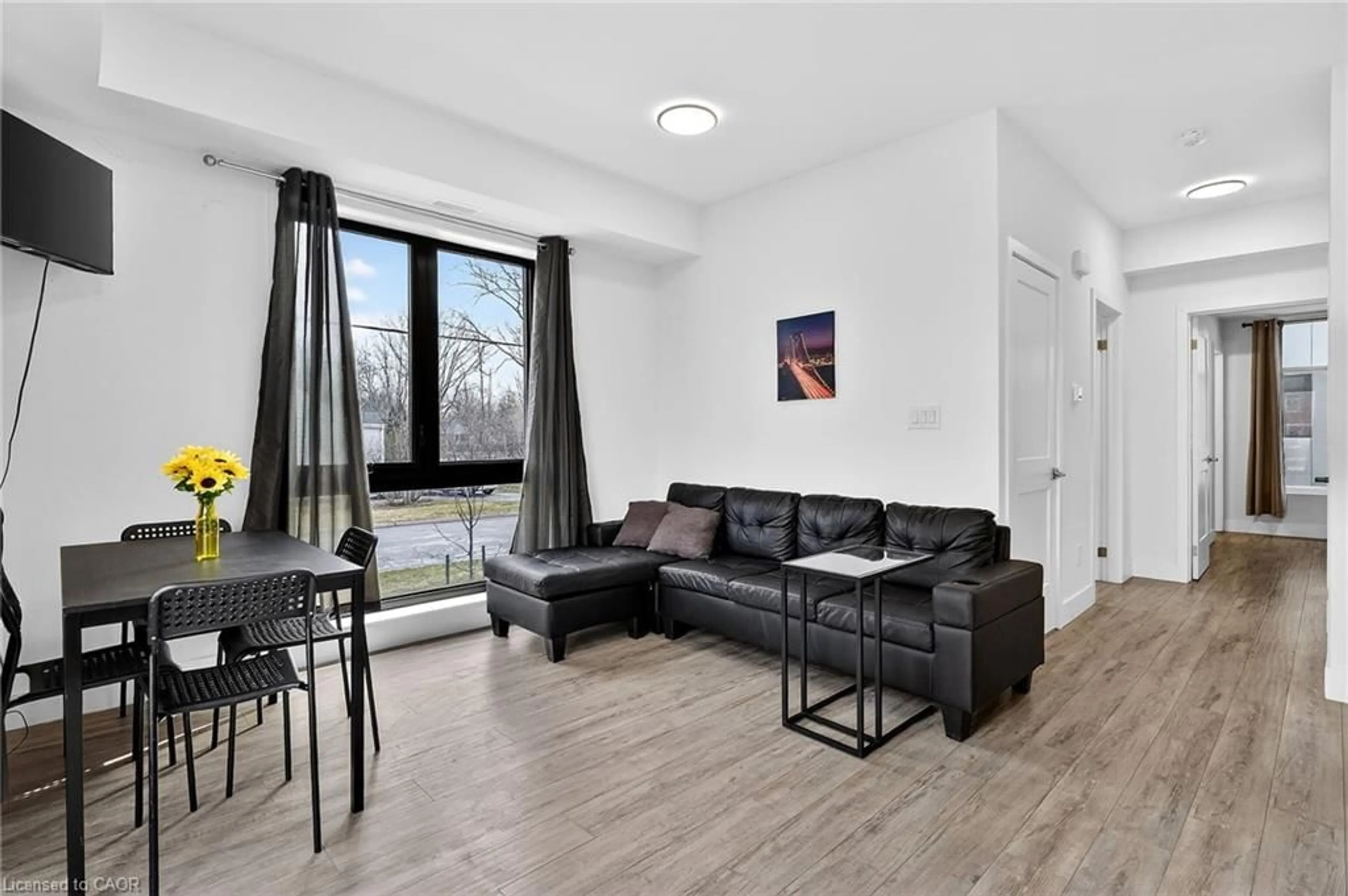 Living room with furniture, unknown for 7277 Wilson Cres #201, Niagara Falls Ontario L2G 4R8