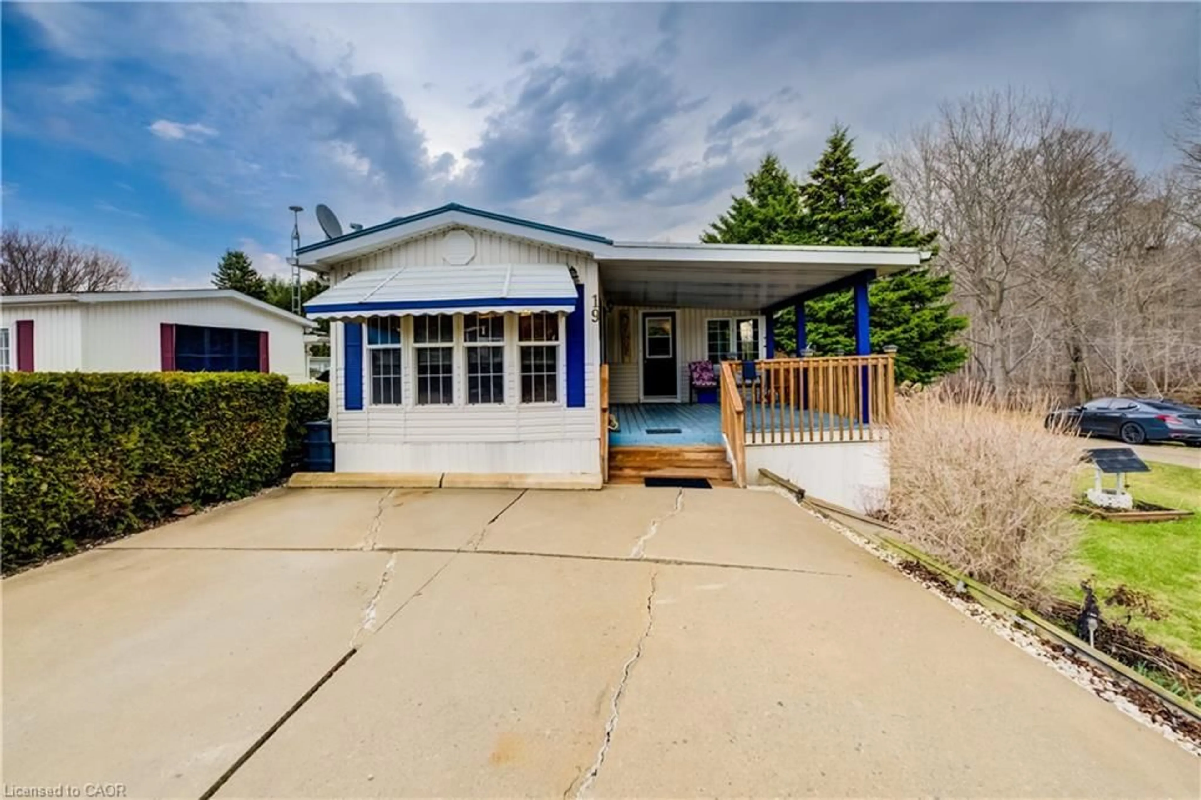 Home with vinyl exterior material, street for 592968 Oxford Rd 13 #19, Norwich Ontario N0J 1P0