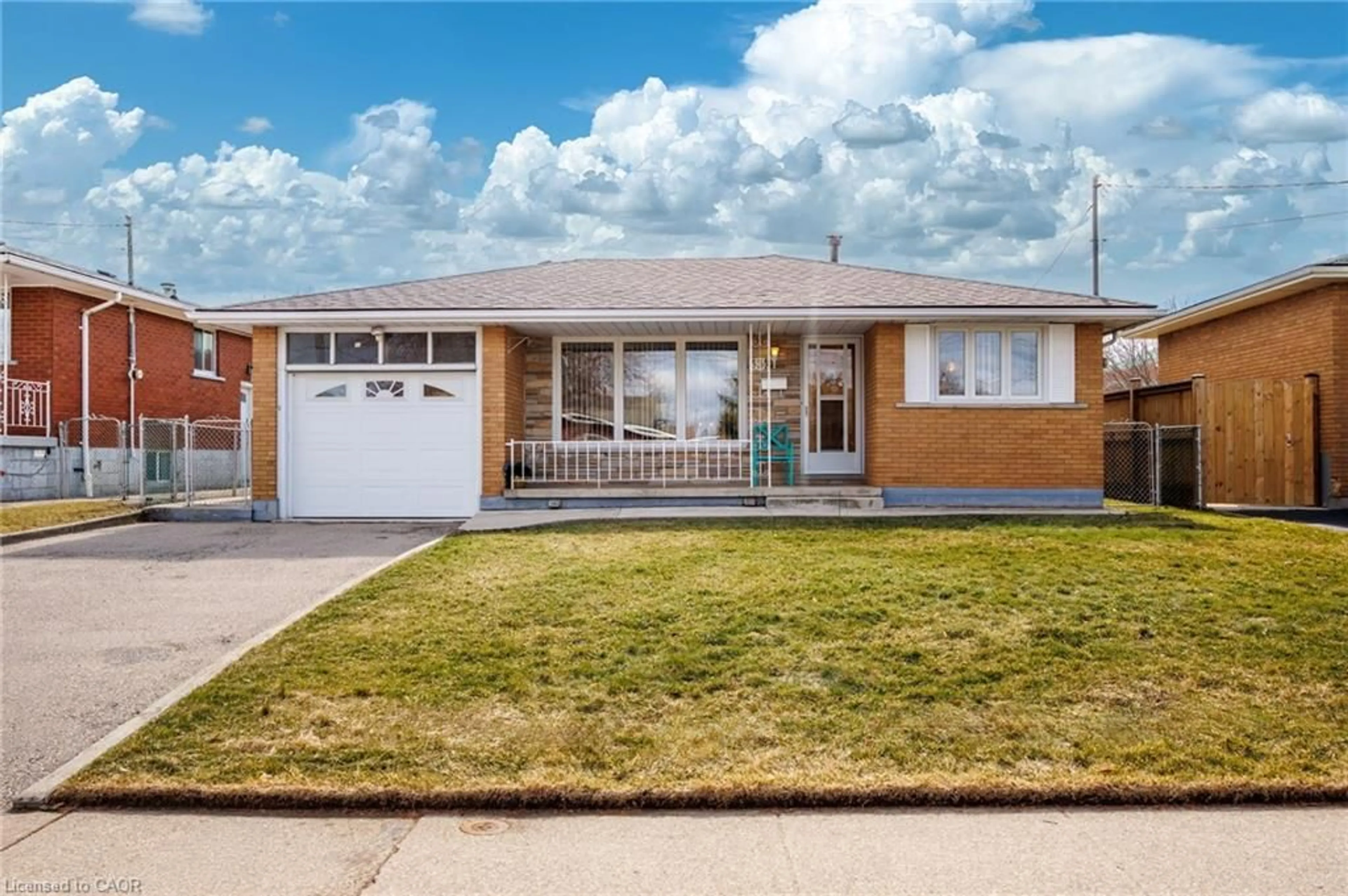 Home with brick exterior material, street for 33 Orlanda Rd, Hamilton Ontario L8G 2K3