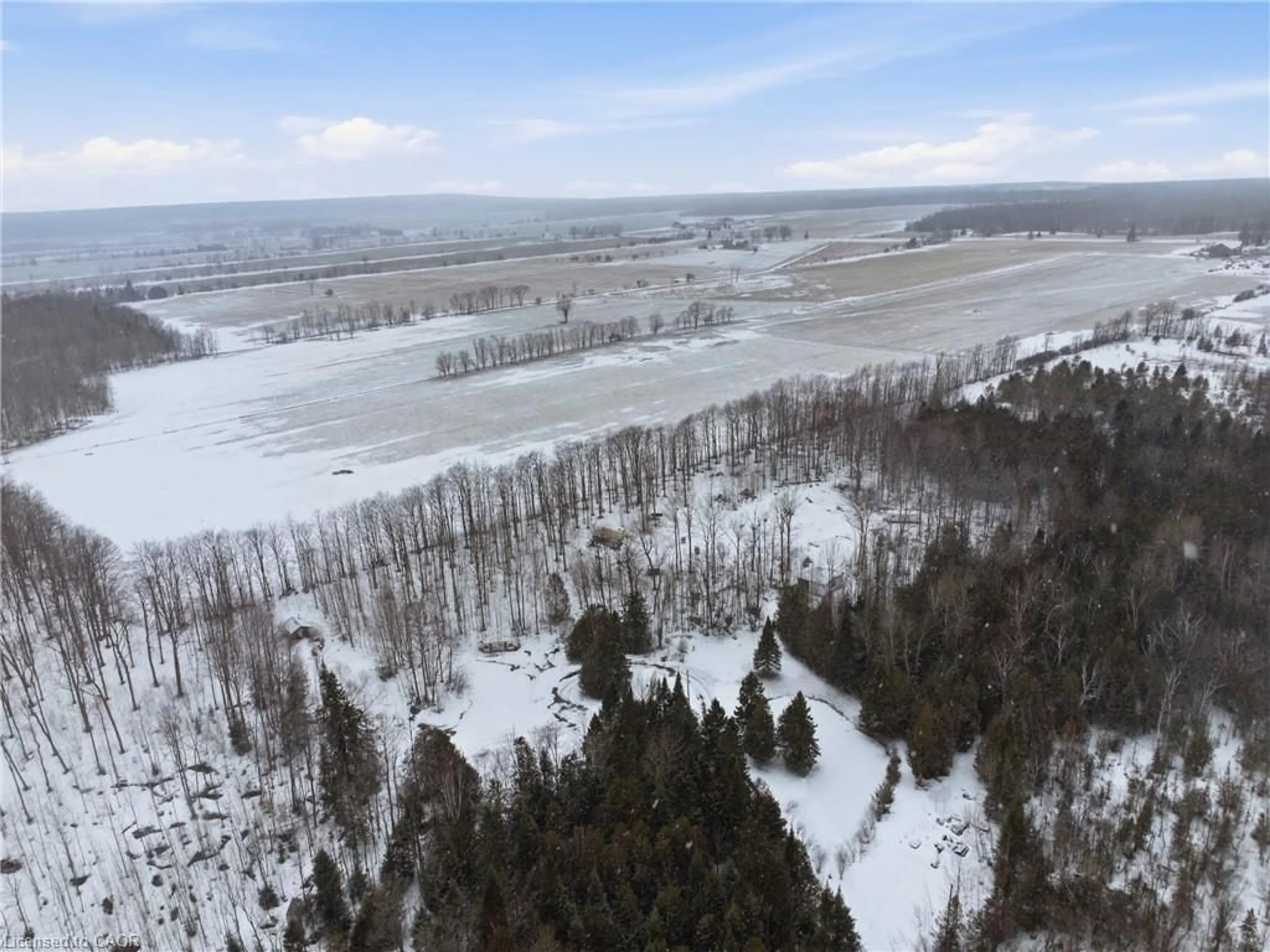 A pic from outside/outdoor area/front of a property/back of a property/a pic from drone, forest/trees view for 112314 Grey County Road 14, Southgate Ontario N0C 1B0