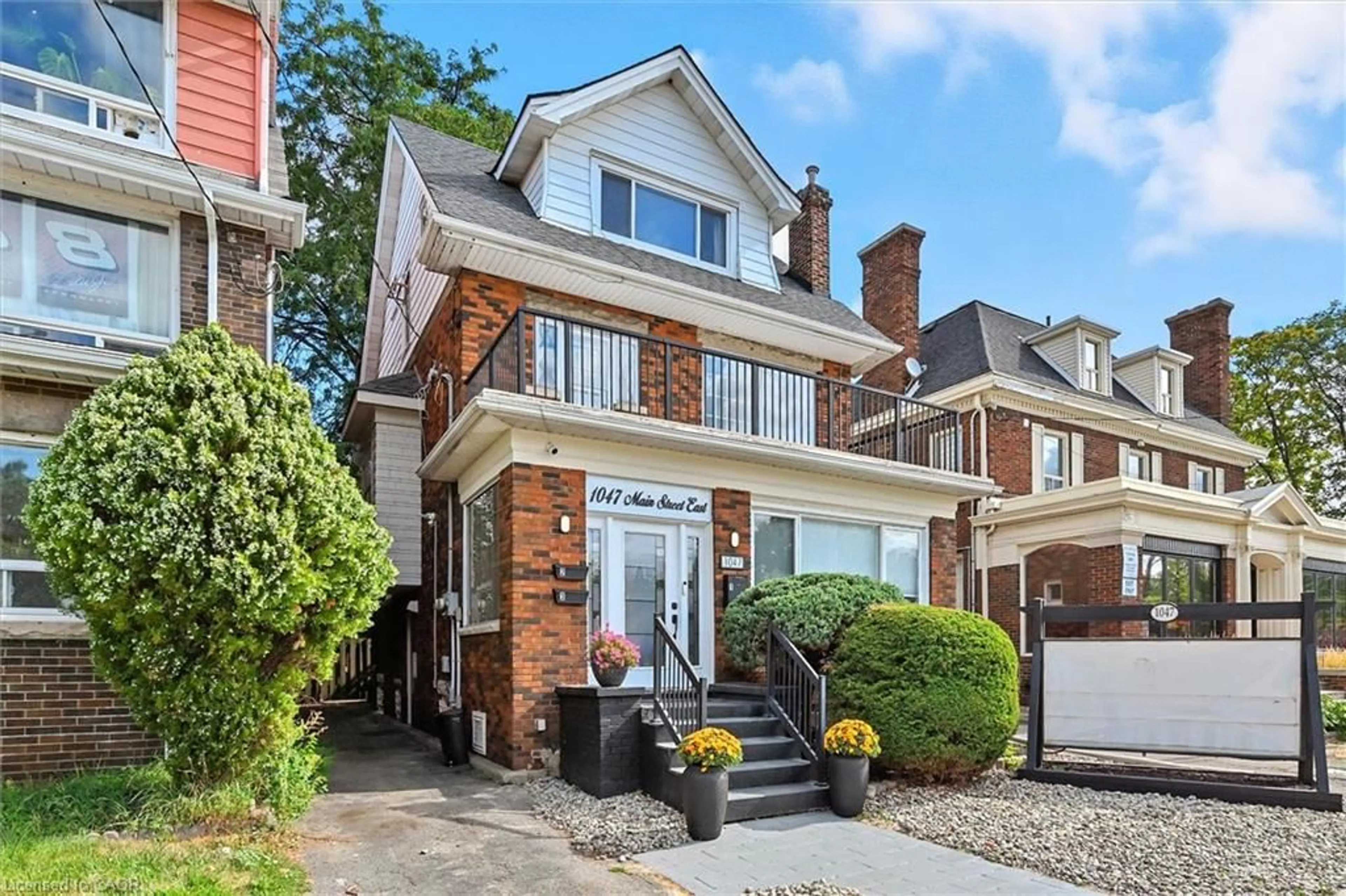 Home with brick exterior material, street for 1047 Main St, Hamilton Ontario L8M 1N5