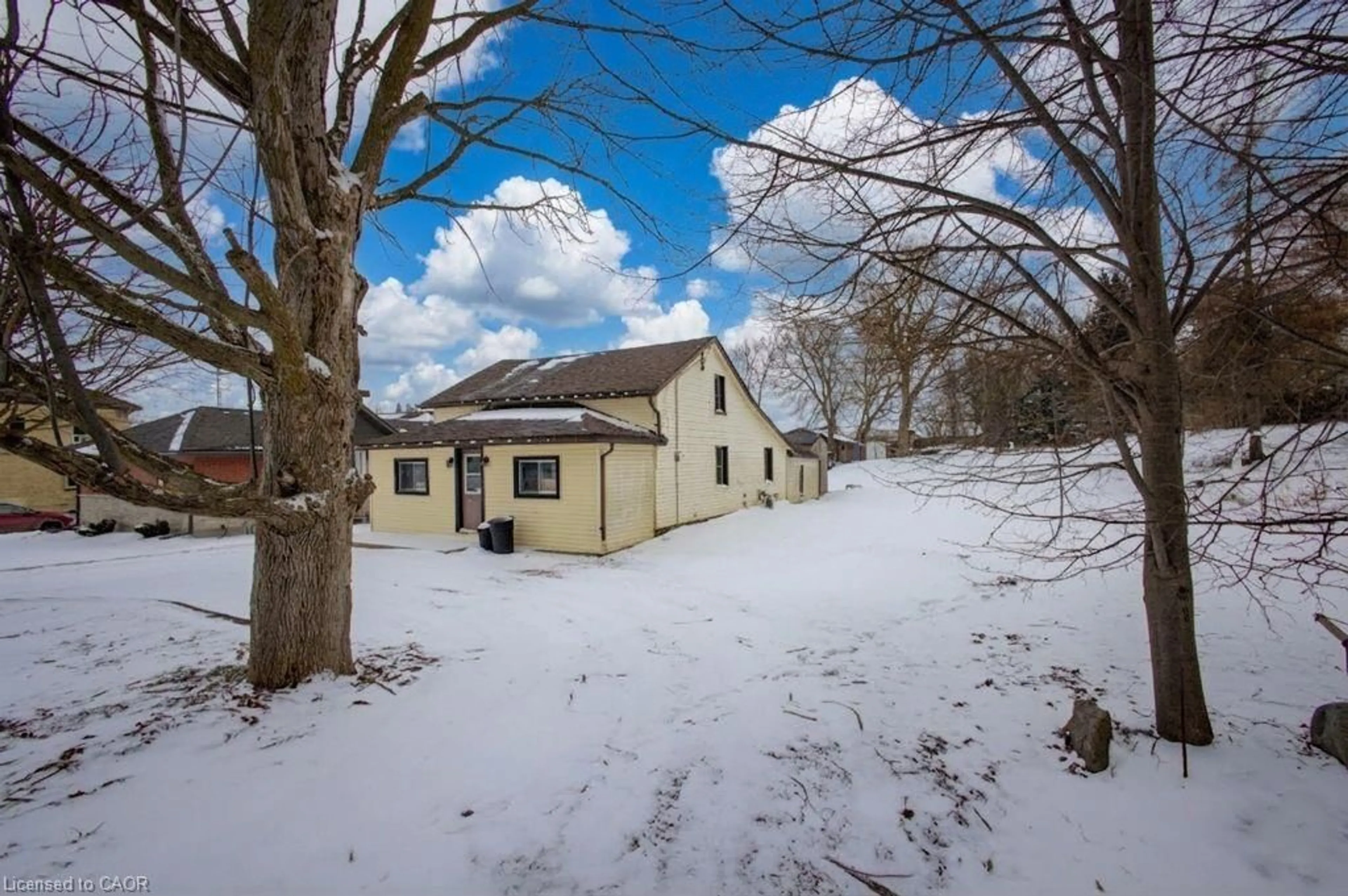 A pic from outside/outdoor area/front of a property/back of a property/a pic from drone, building for 21 Main St, Drayton Ontario N0G 1P0