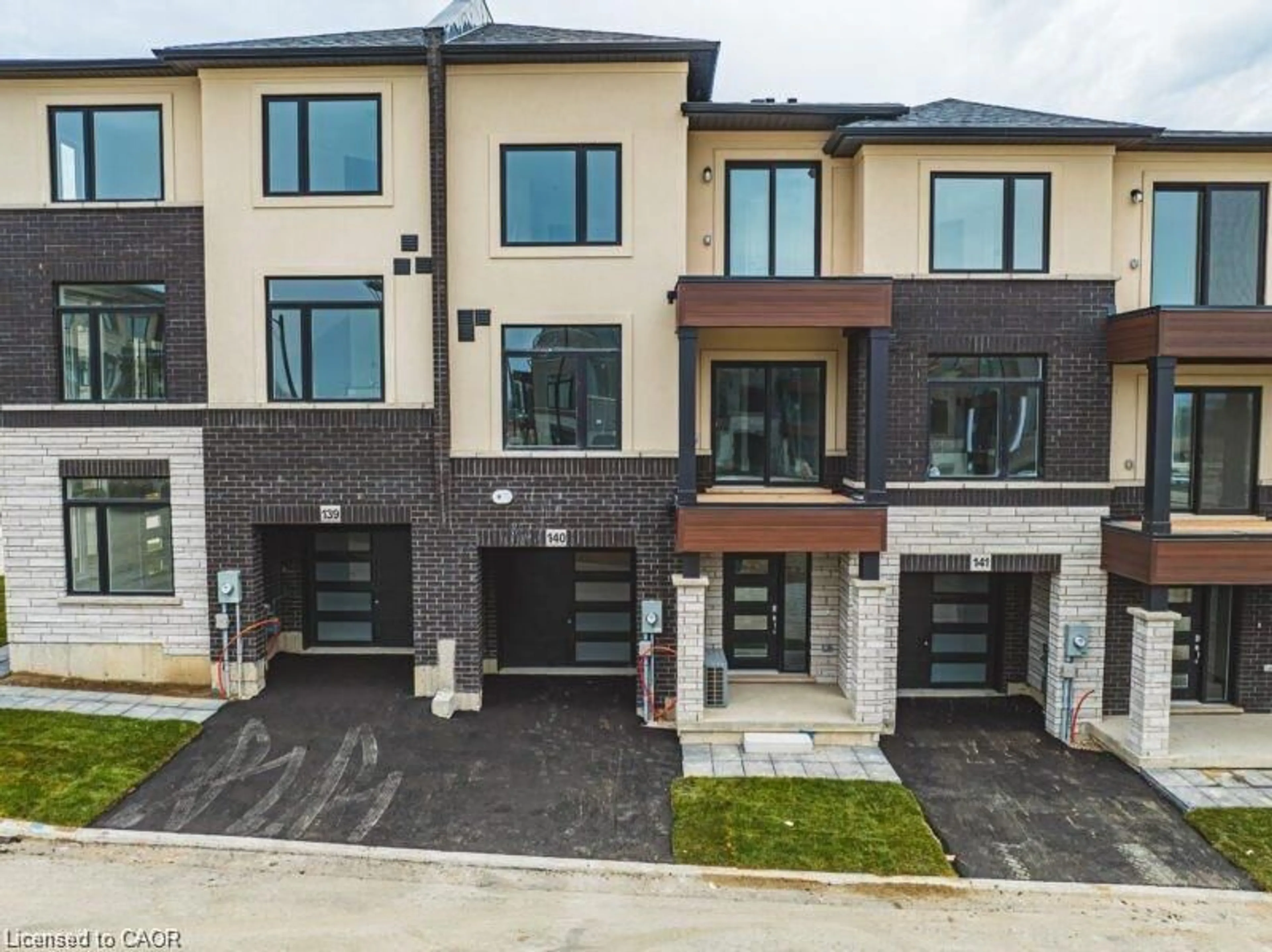 Home with brick exterior material, street for 155 Equestrian Way #141, Cambridge Ontario N3E 0B8